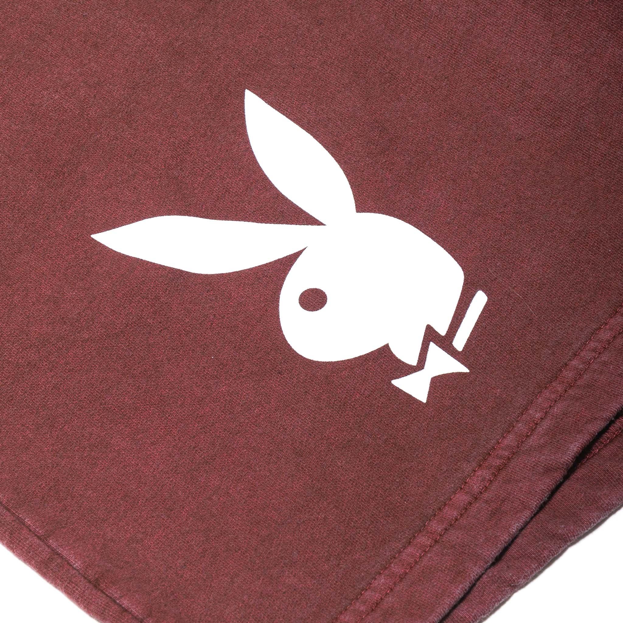 Maroon sweatshorts featuring a white bunny head graphic on soft fabric