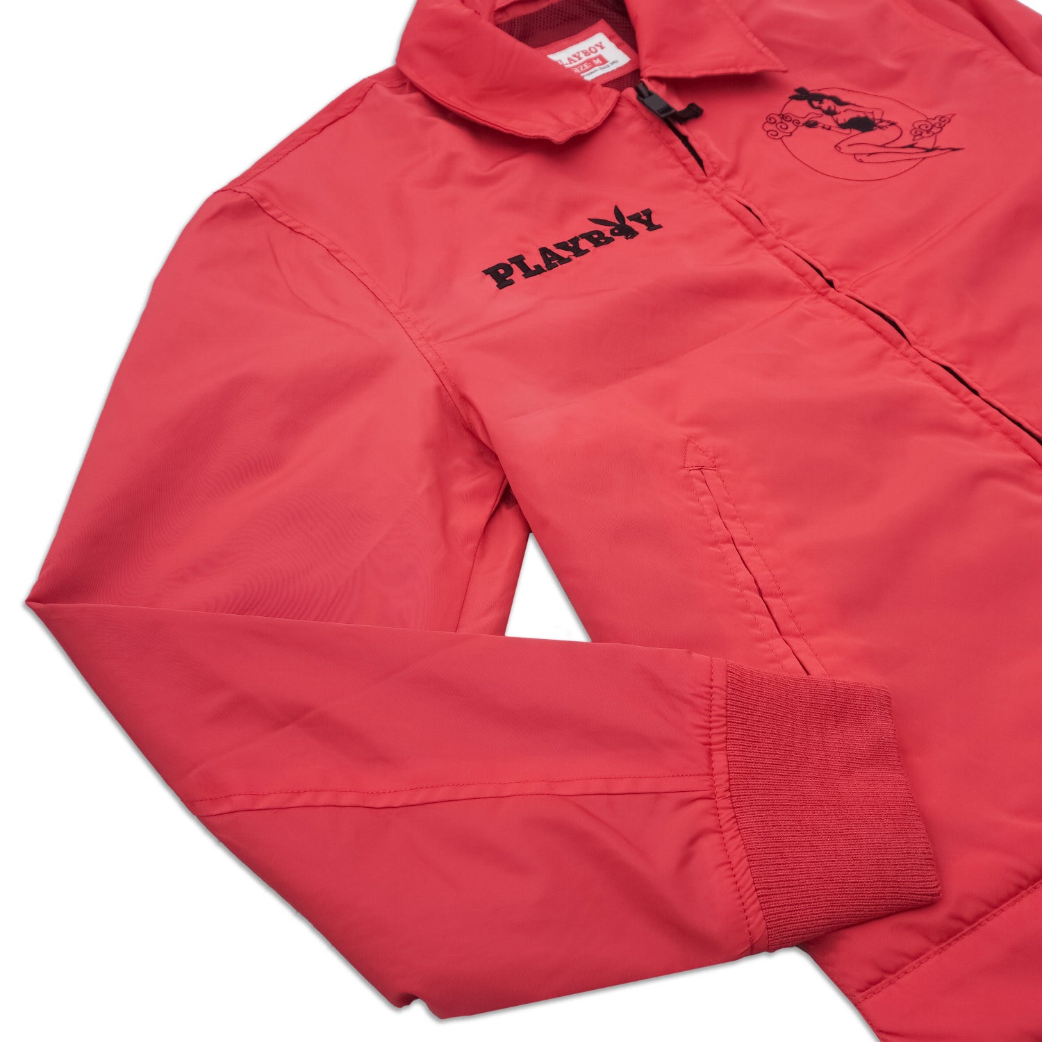 Red jacket with 'Playboy' branding on a white background