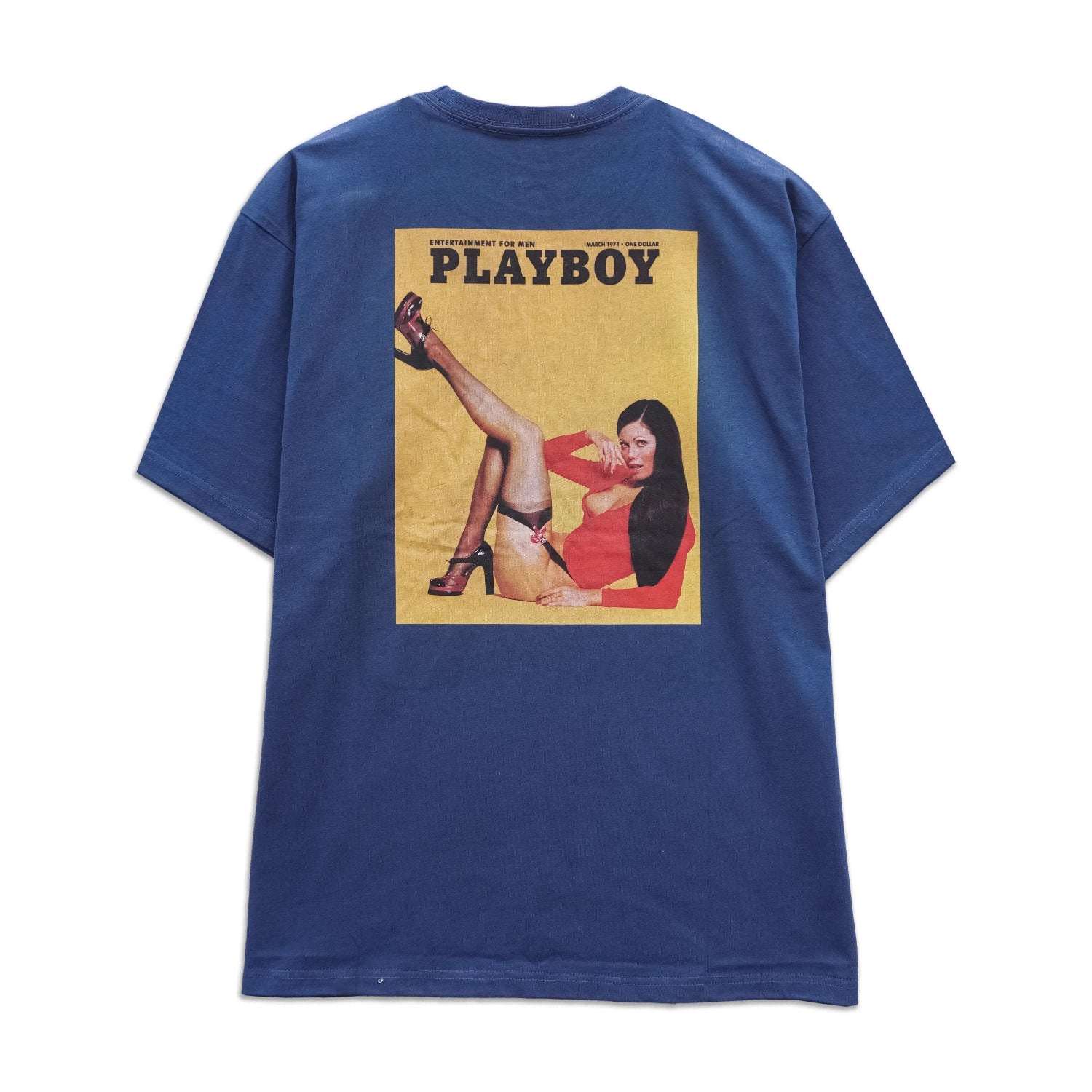 Navy blue graphic t-shirt featuring a vintage-style magazine cover with a woman in red.