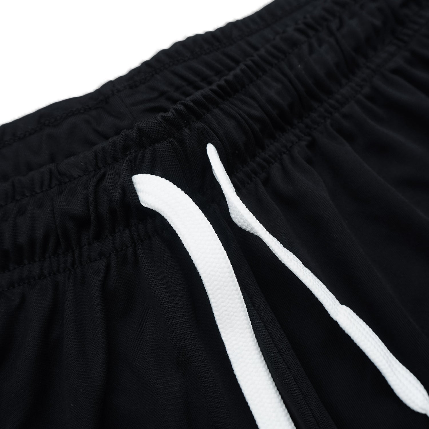 Black shorts with white drawstring on a white background