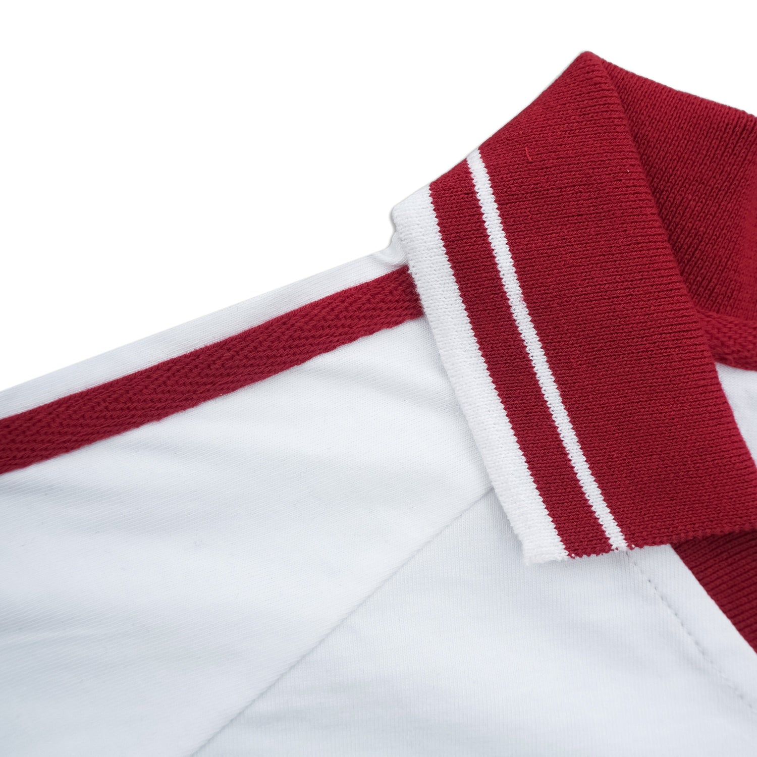 White shirt with red and white striped trim on a white background