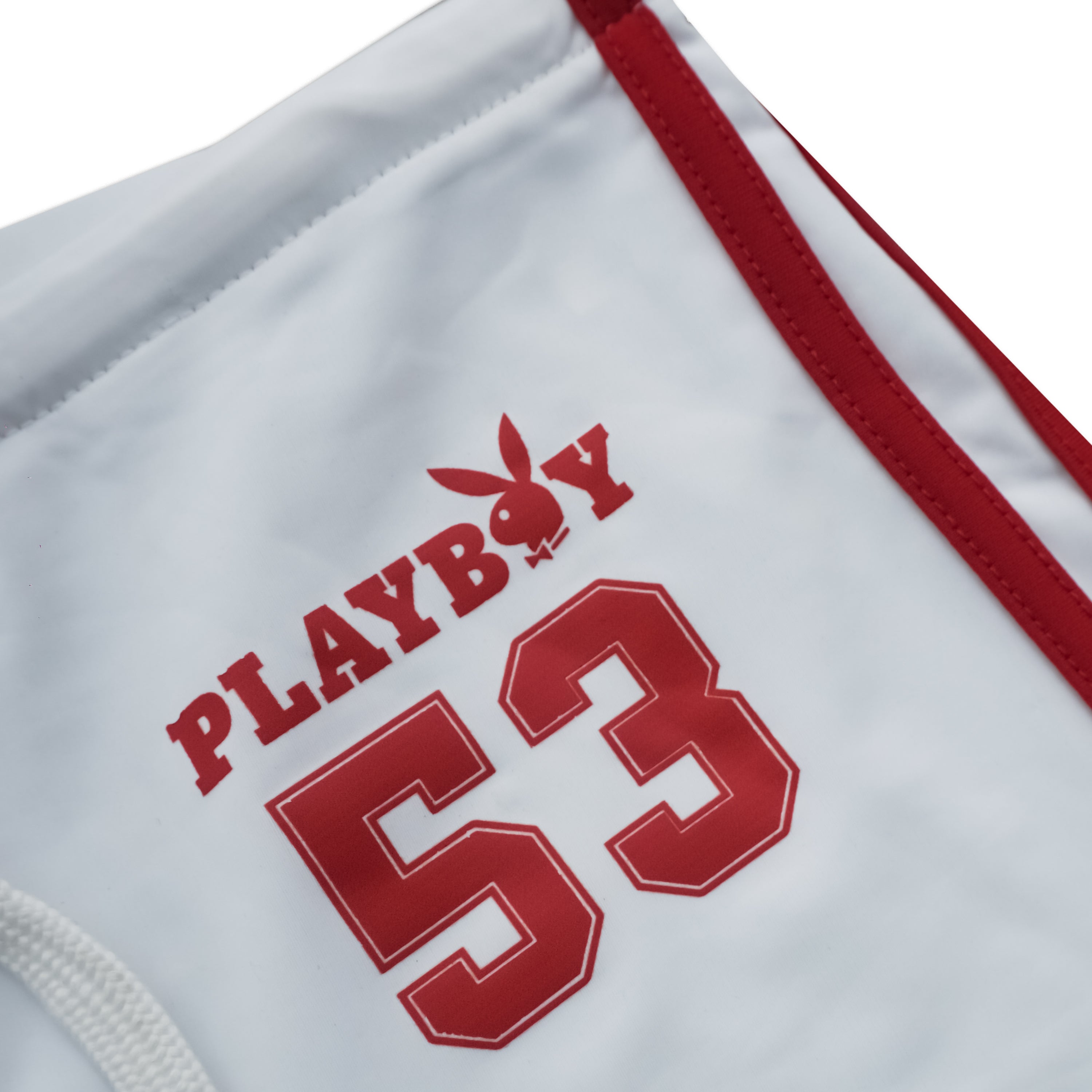 Close-up of a white athletic jersey with red trim, featuring the red Playboy logo and the number 53 on the front.