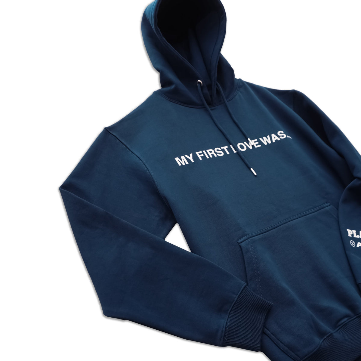 A navy blue pullover hoodie with white text reading 'MY FIRST LOVE WAS.' across the chest, shown on a clean white background.