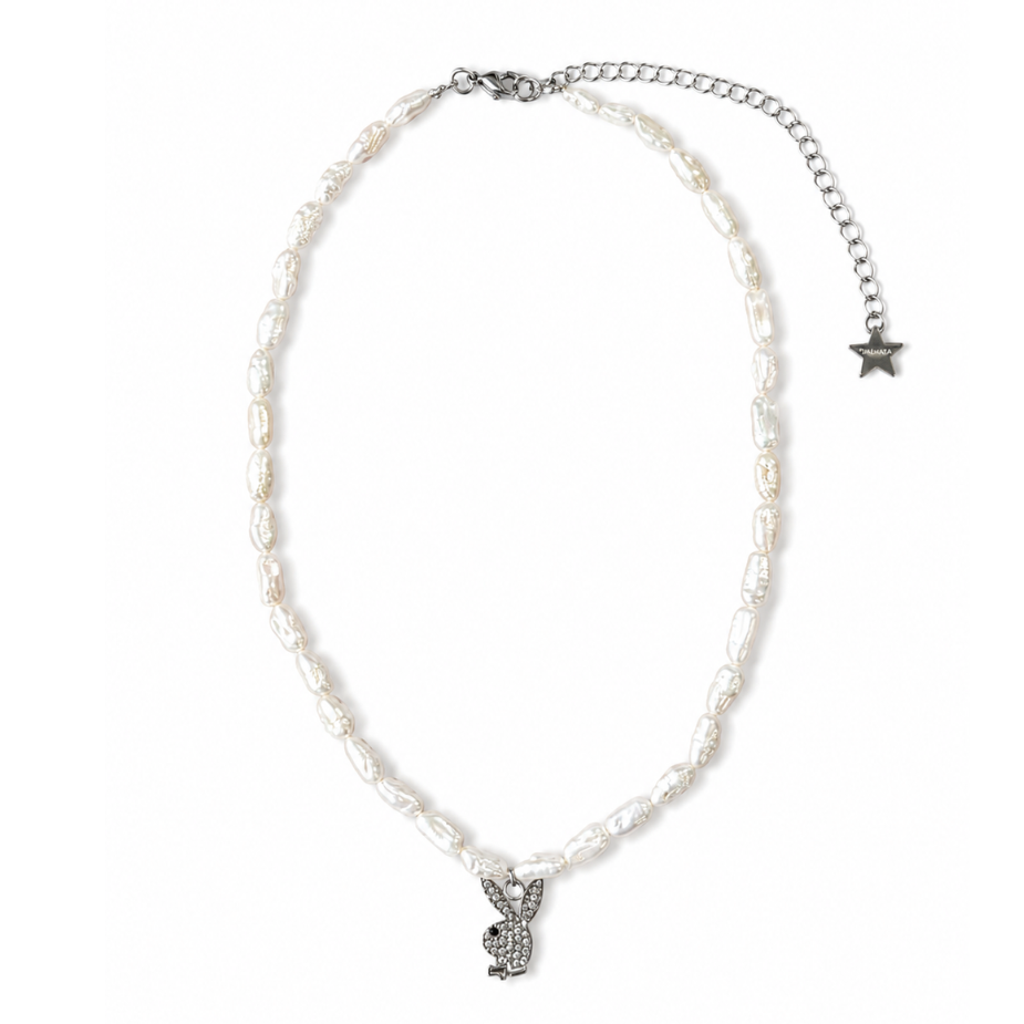 Pearl necklace with a silver charm on a white background