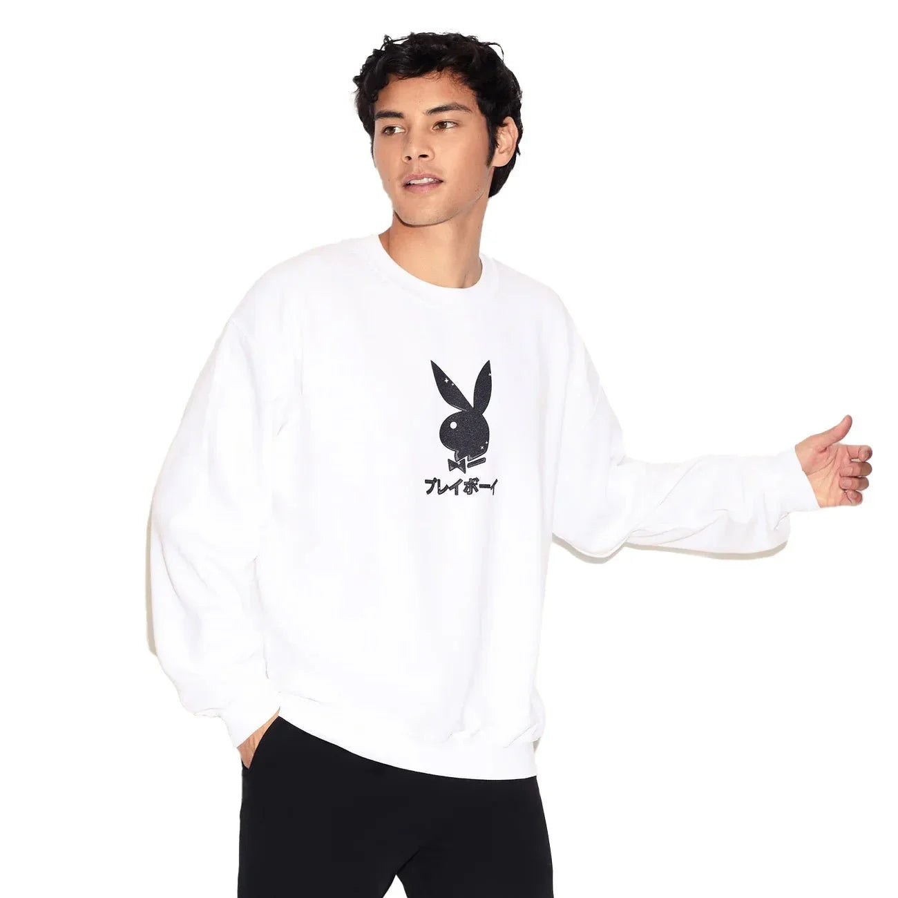 Man wearing white crewneck sweatshirt with black bunny graphic and Japanese text on front