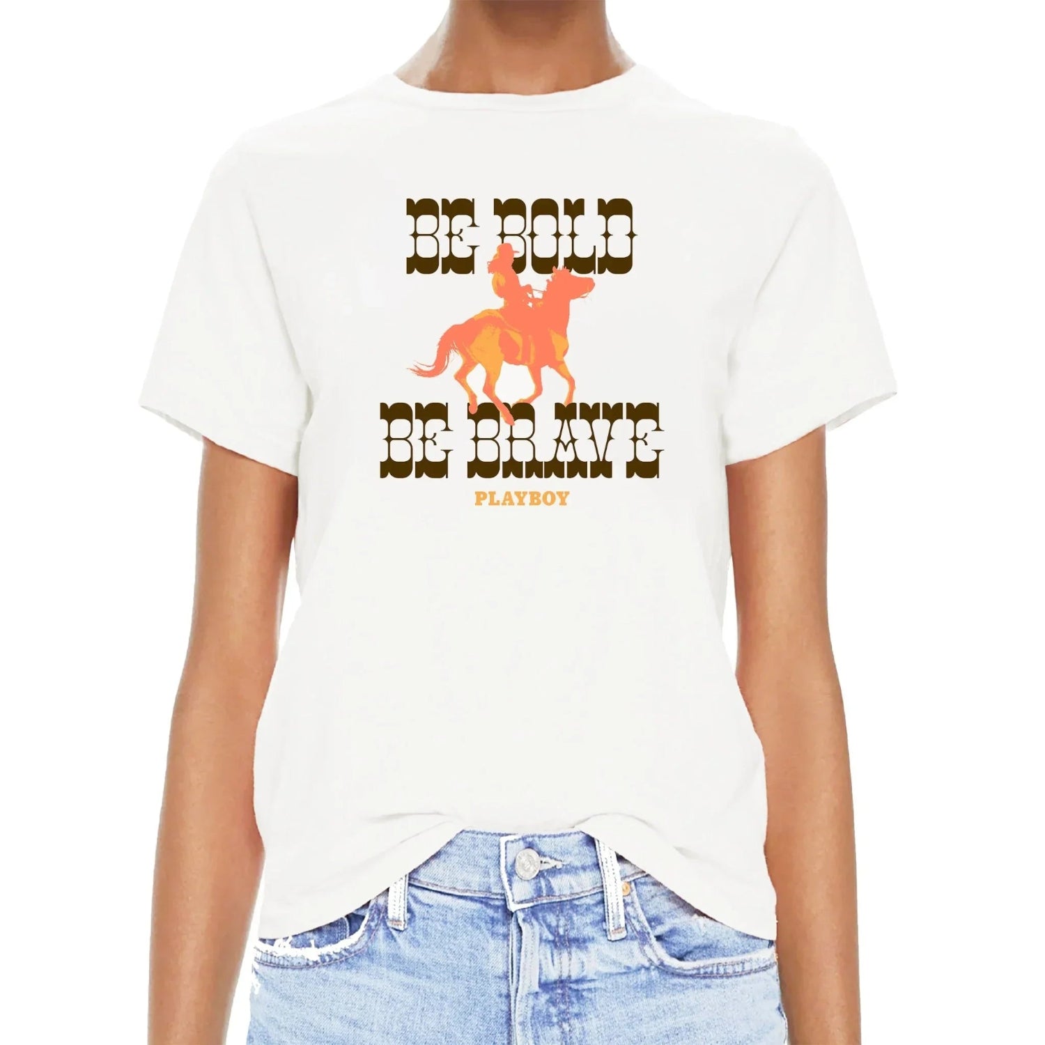 White t-shirt with western graphic, cowboy on horse, text 'Be Bold Be Brave Playboy'.