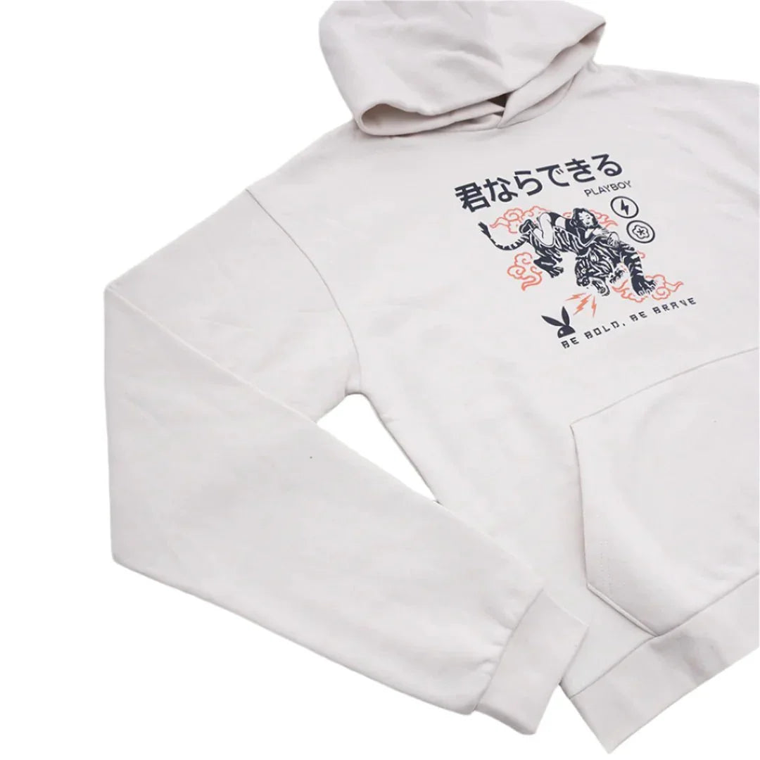 White hoodie with tiger and Japanese text graphic, front pocket, and "Be Bold. Be Brave" slogan.