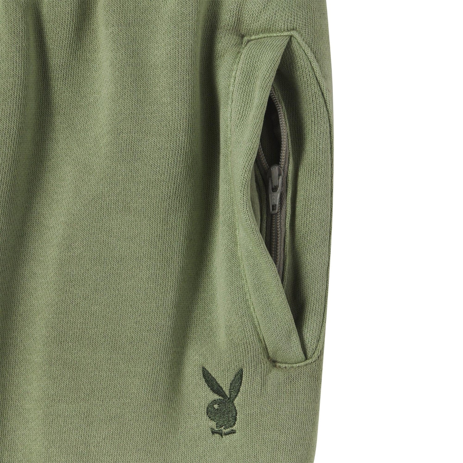 Olive green sweatpants with zippered pocket and embroidered bunny logo detail