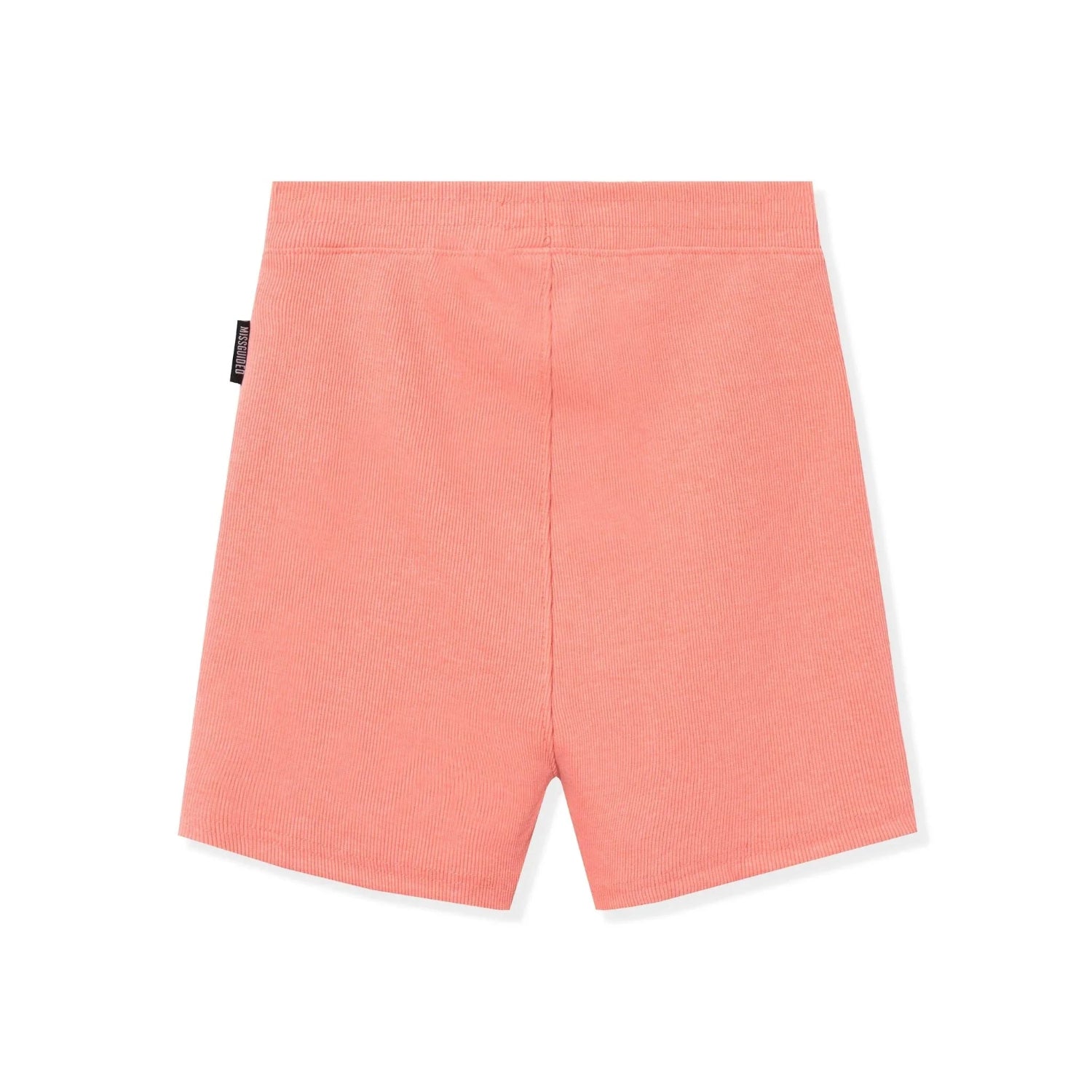 Back view of peach pink classic biking shorts with ribbed texture on white background