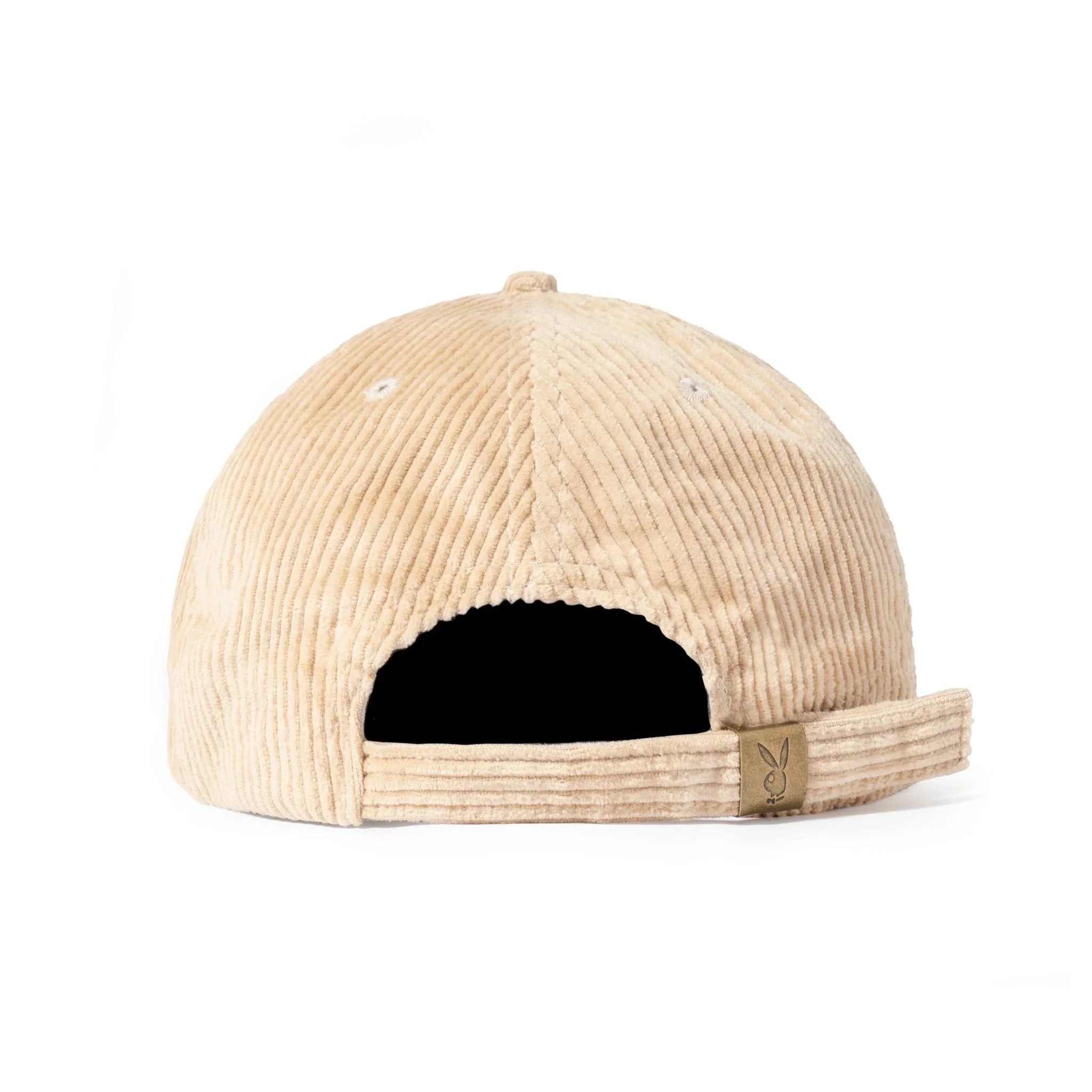 Beige corduroy hat with adjustable strap and small bunny logo tag on the back