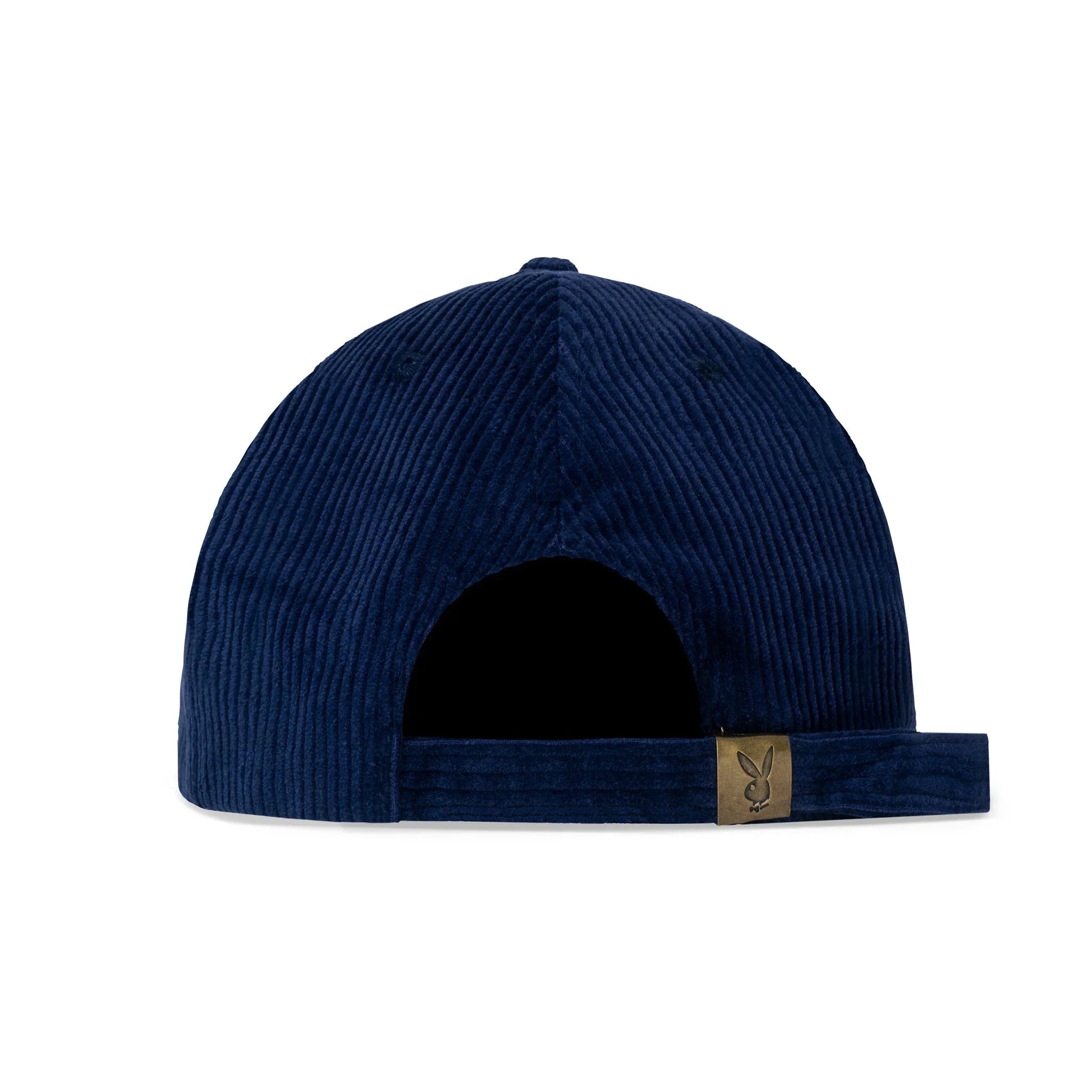Back view of navy corduroy hat with adjustable strap and metal logo accent