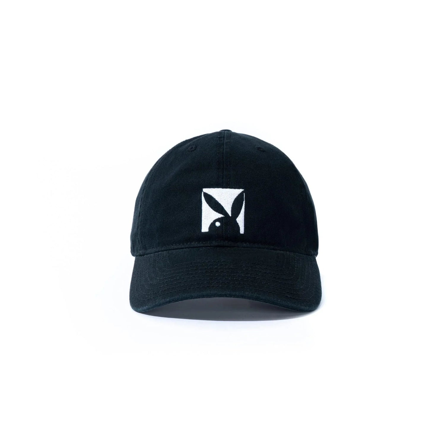 Black dad hat with white rabbit head logo embroidered on front, adjustable strap back
