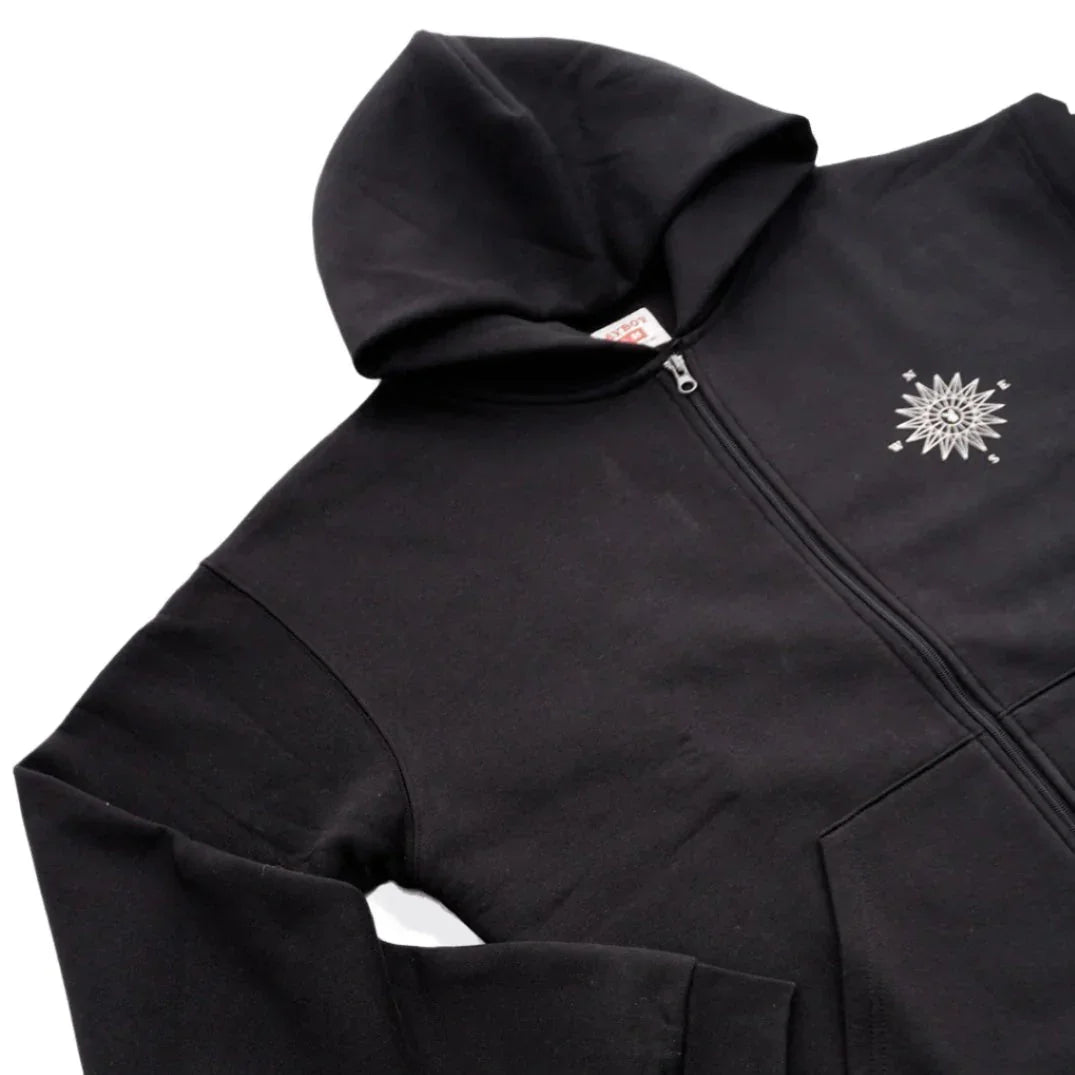 Black zip-up hoodie with compass graphic on chest, front pockets, and attached hood