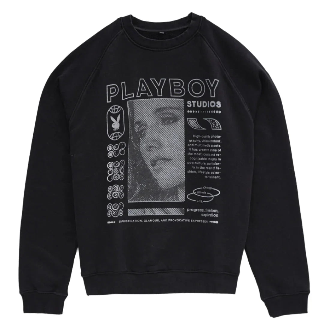 Black sweatshirt featuring graphic face, text, and symbols on front, streetwear style