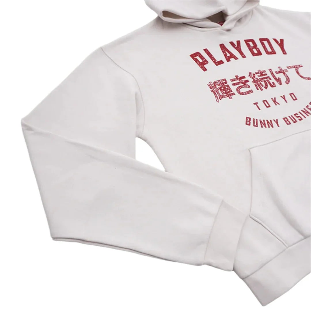 White Tokyo hoodie with red graphic text and front pocket, laid flat on a white background.
