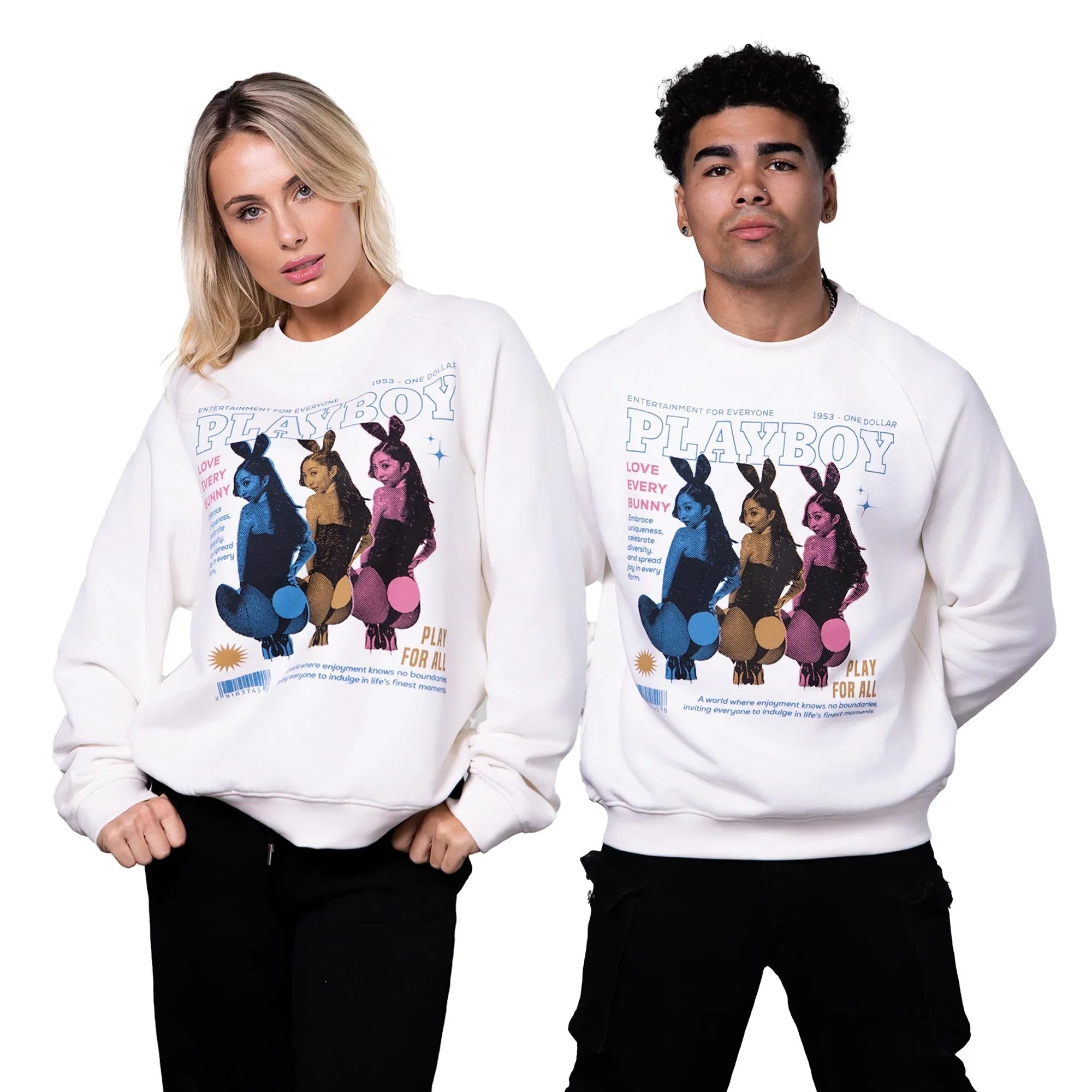Two models wearing white sweatshirts with colorful bunny graphic and bold text on the front
