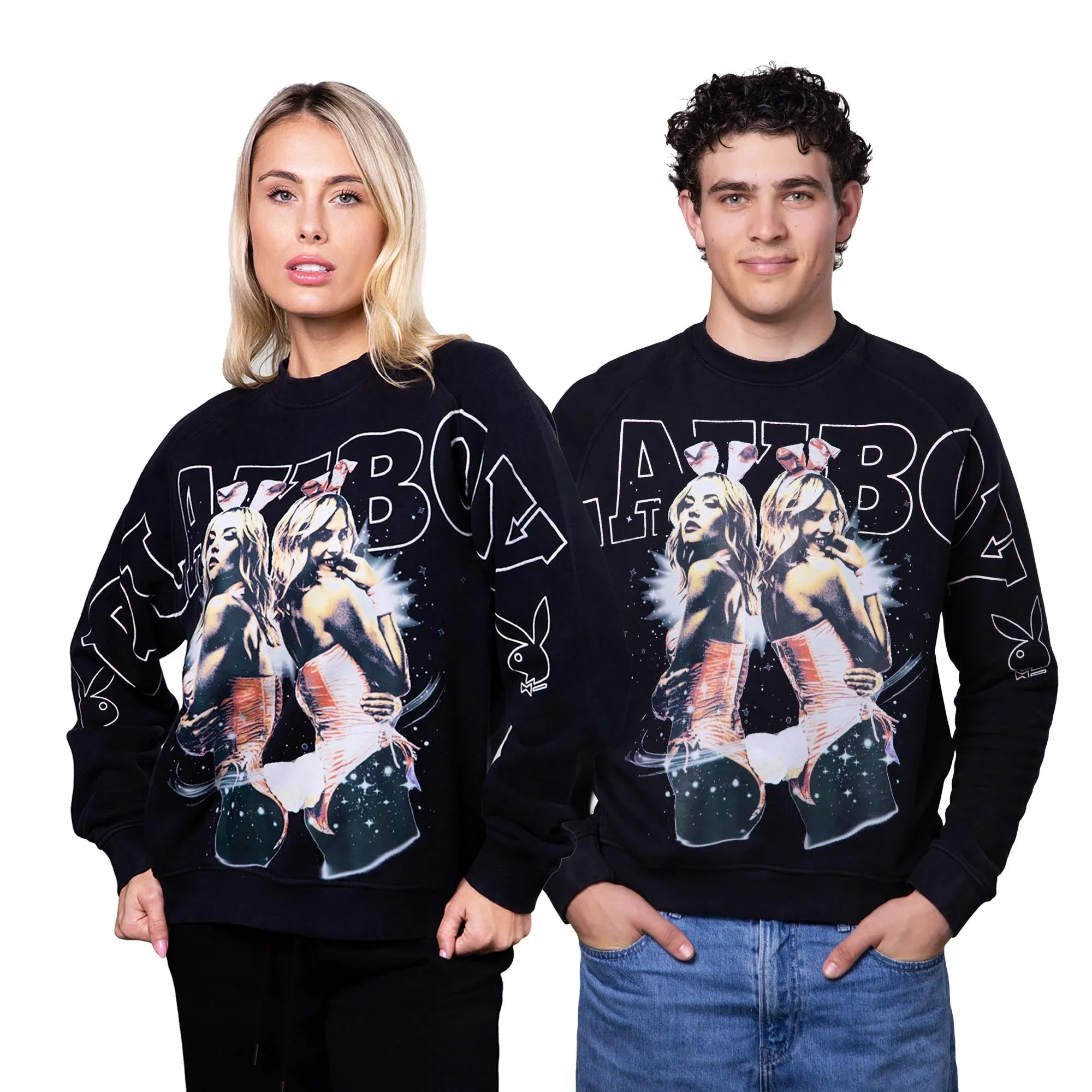 Two models wear black sweatshirts with bold graphic prints of women, bunny ears, and large lettering.