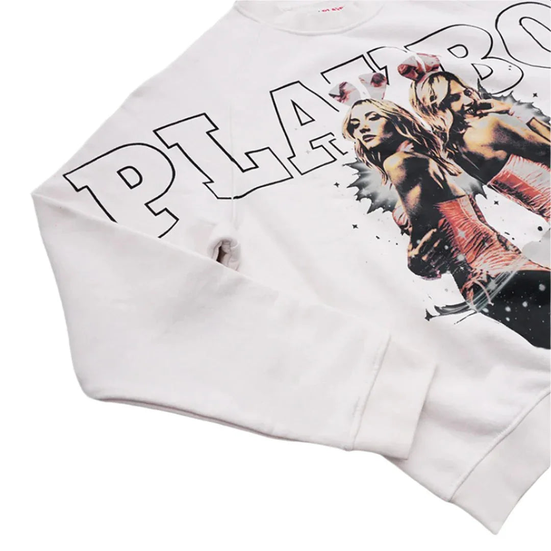 White sweatshirt with large PLAYBOY text and graphic print of two women in pink outfits