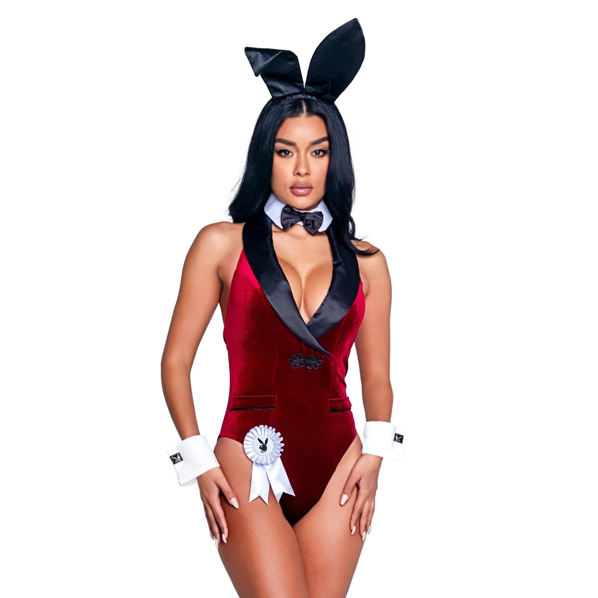 Woman wearing red velvet bunny costume with black satin collar, bow tie, cuffs, and bunny ears.