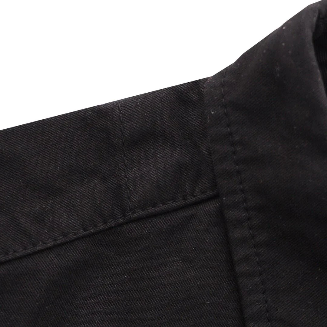 Close-up of black button-up shirt collar with visible stitching detail