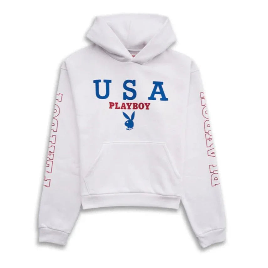 White hoodie with 'USA' and 'Playboy' text, blue rabbit logo, red sleeve lettering.