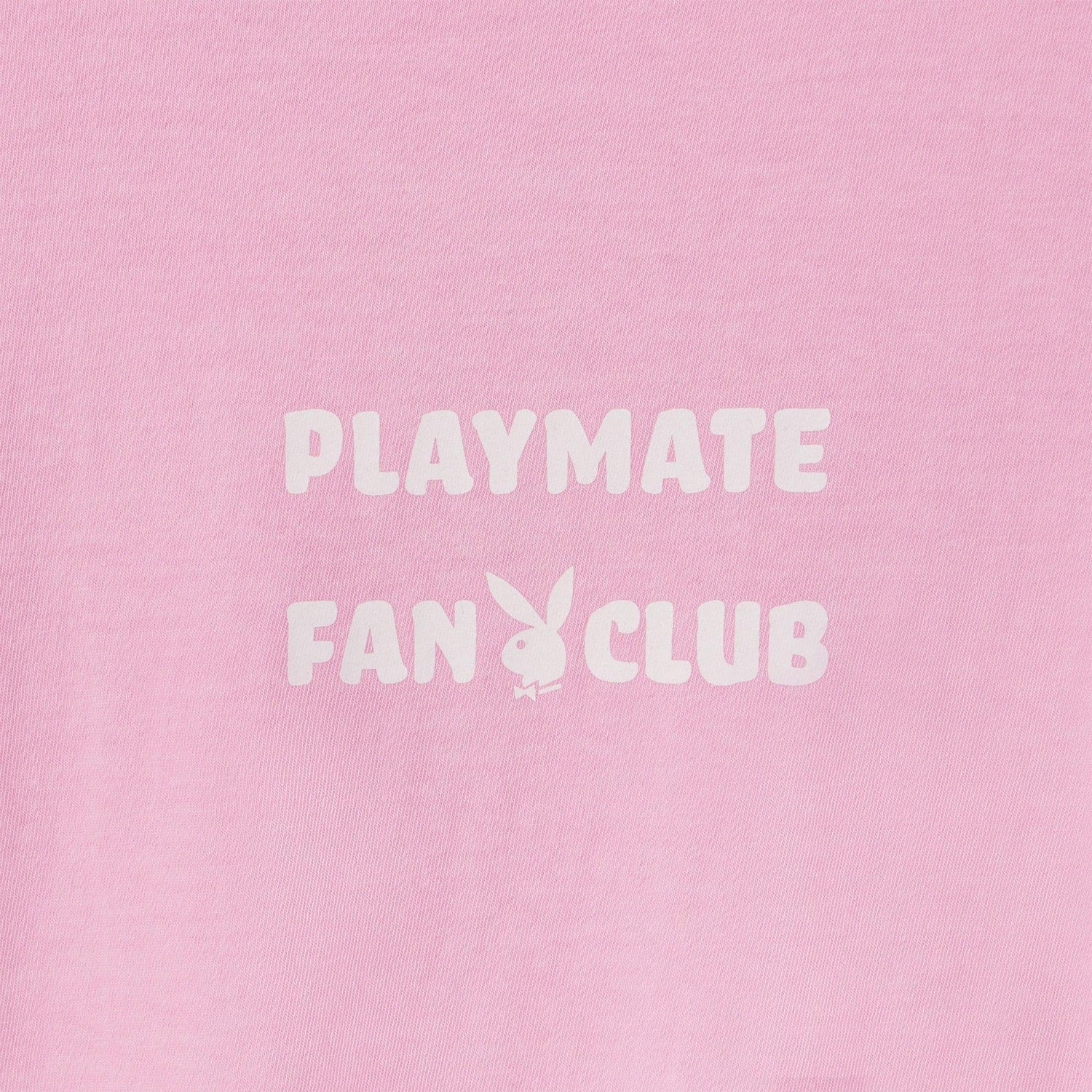 Pink tank top with white Playmate Fan Club text and bunny logo, close-up view