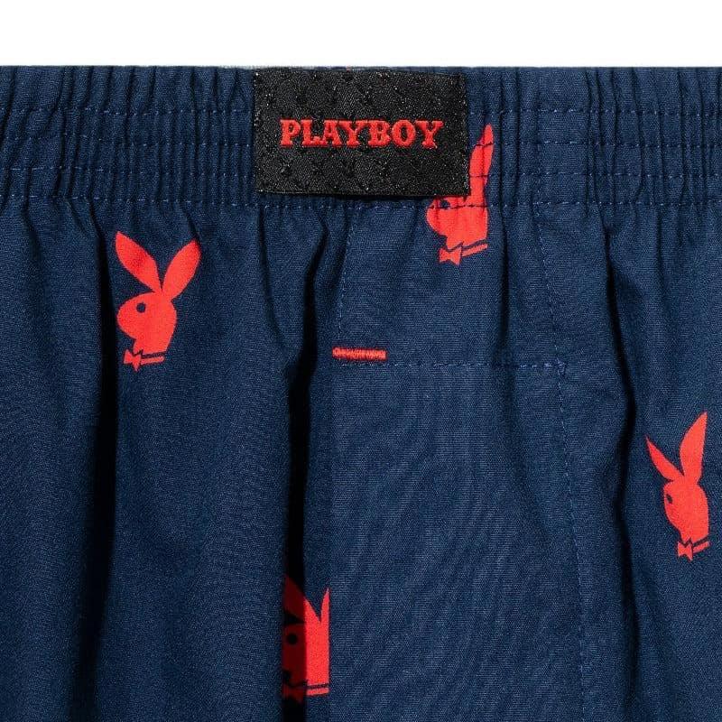 Navy lounge shorts with red repeating rabbit head pattern and PLAYBOY logo on waistband