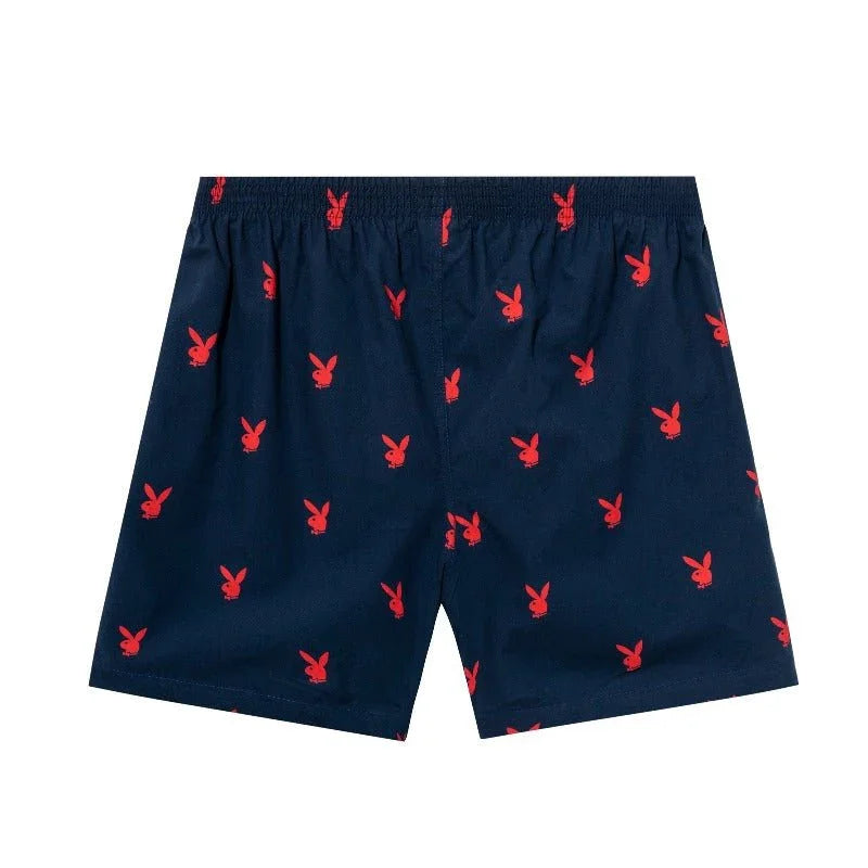 Navy lounge shorts with all-over red rabbit head print, elastic waistband, men's apparel