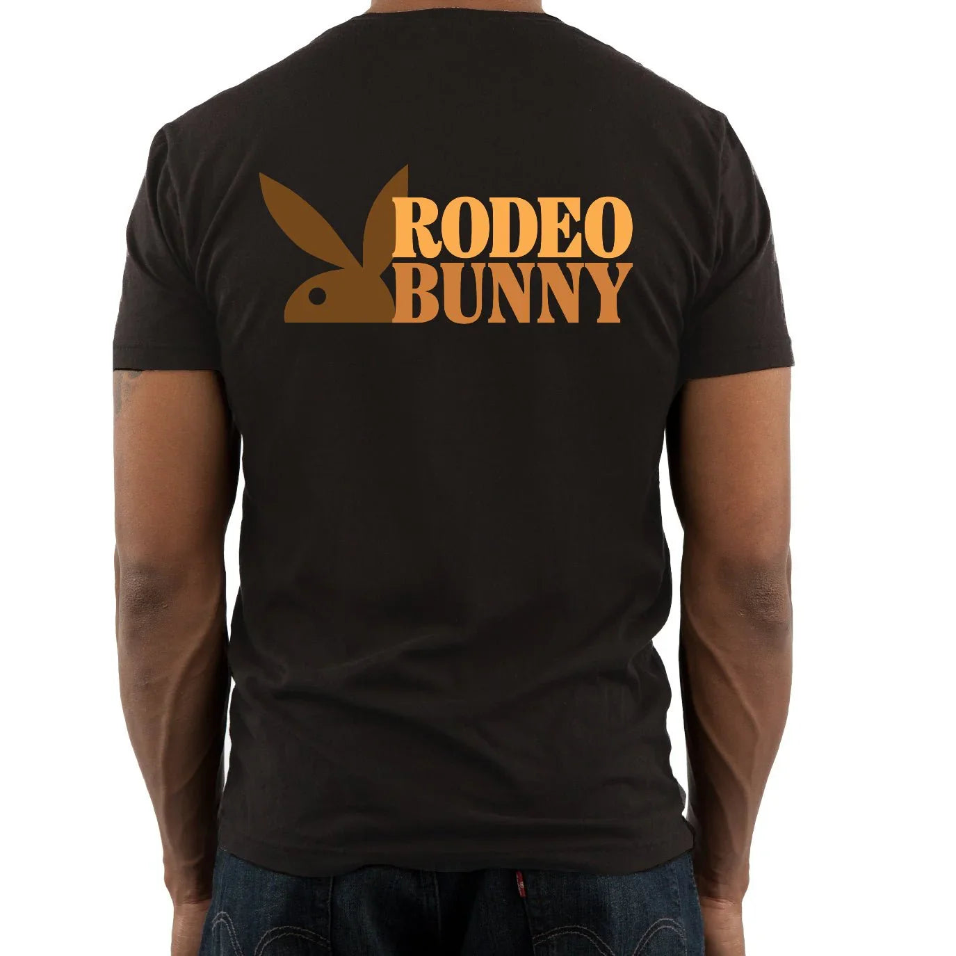 Back view of man wearing black t-shirt with orange Rodeo Bunny graphic and bunny logo