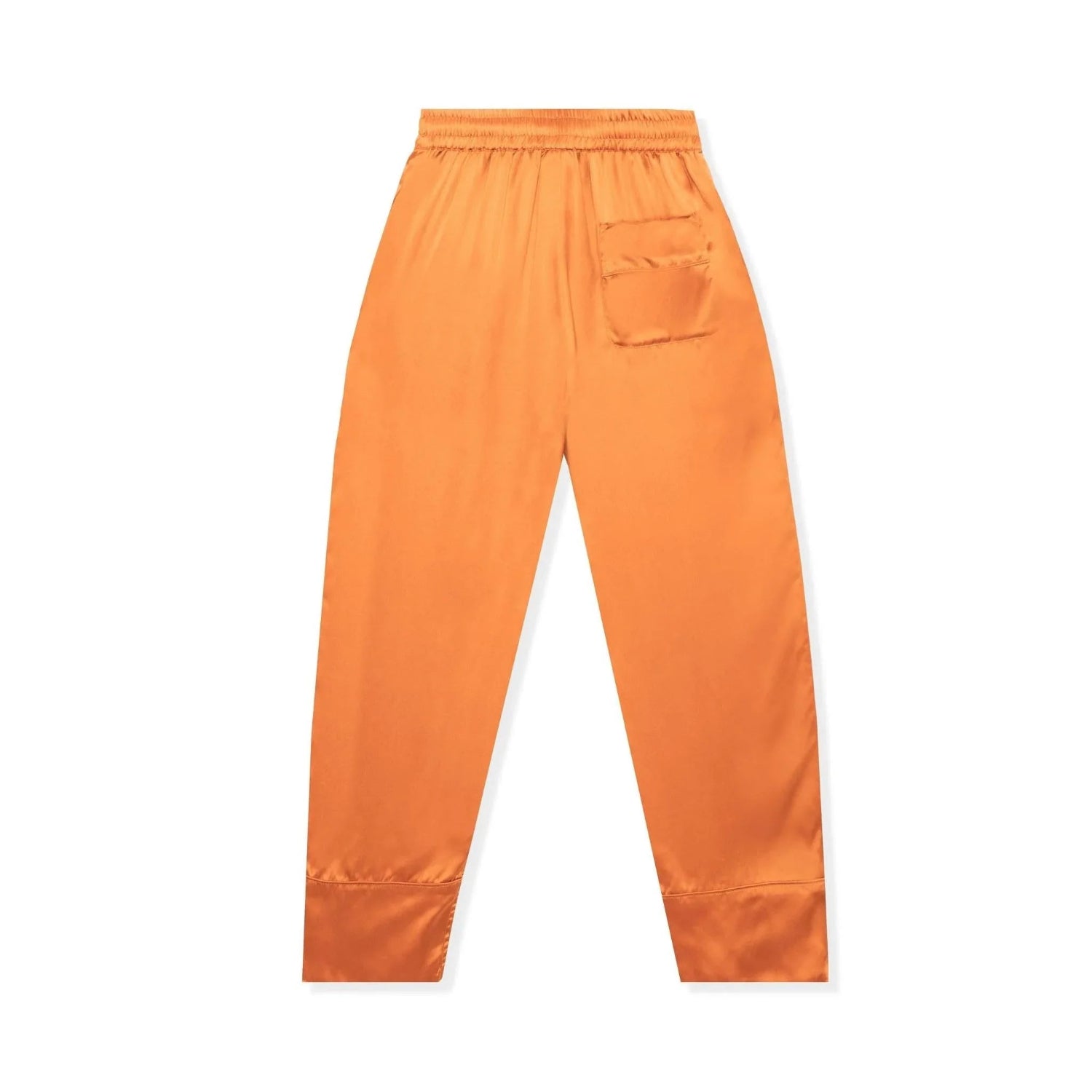 Orange silk lounge pants with elastic waistband and back pocket, laid flat on white background