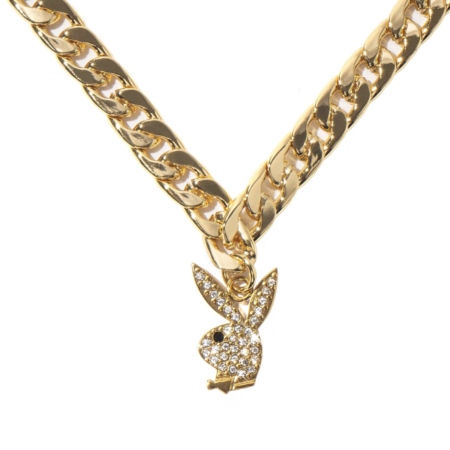 Gold chain choker with crystal rabbit head pendant on white background