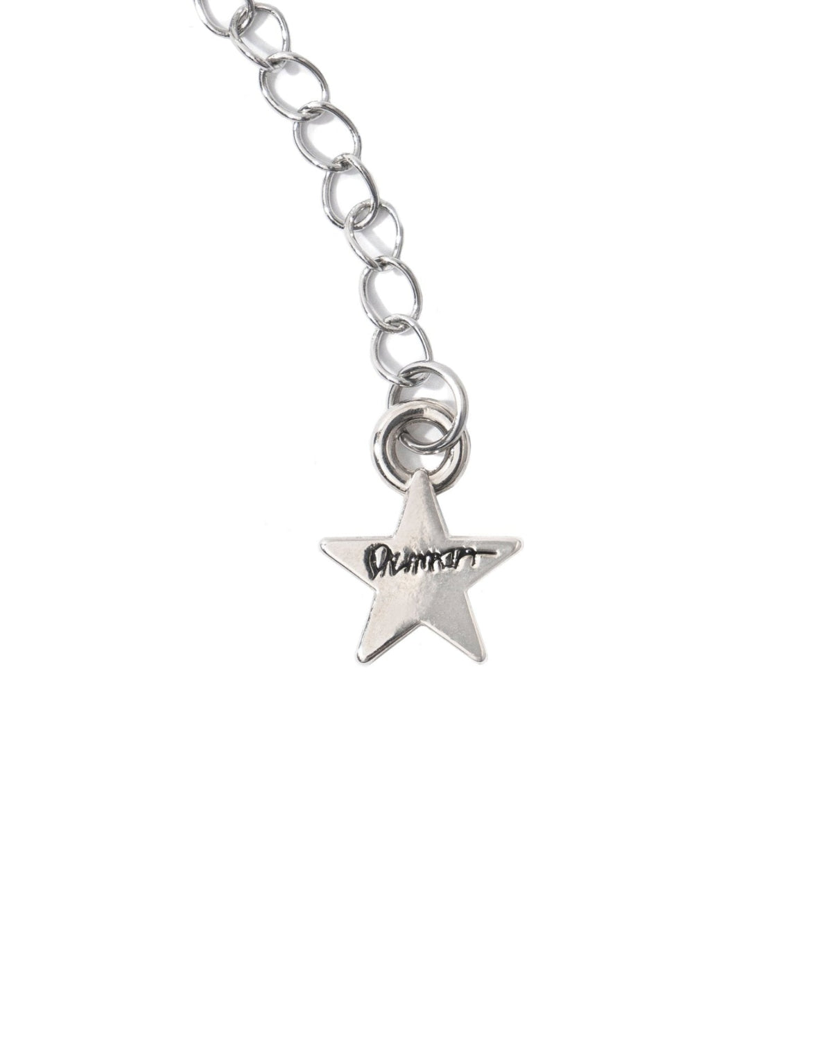 Silver chain necklace with star-shaped charm and engraved text.