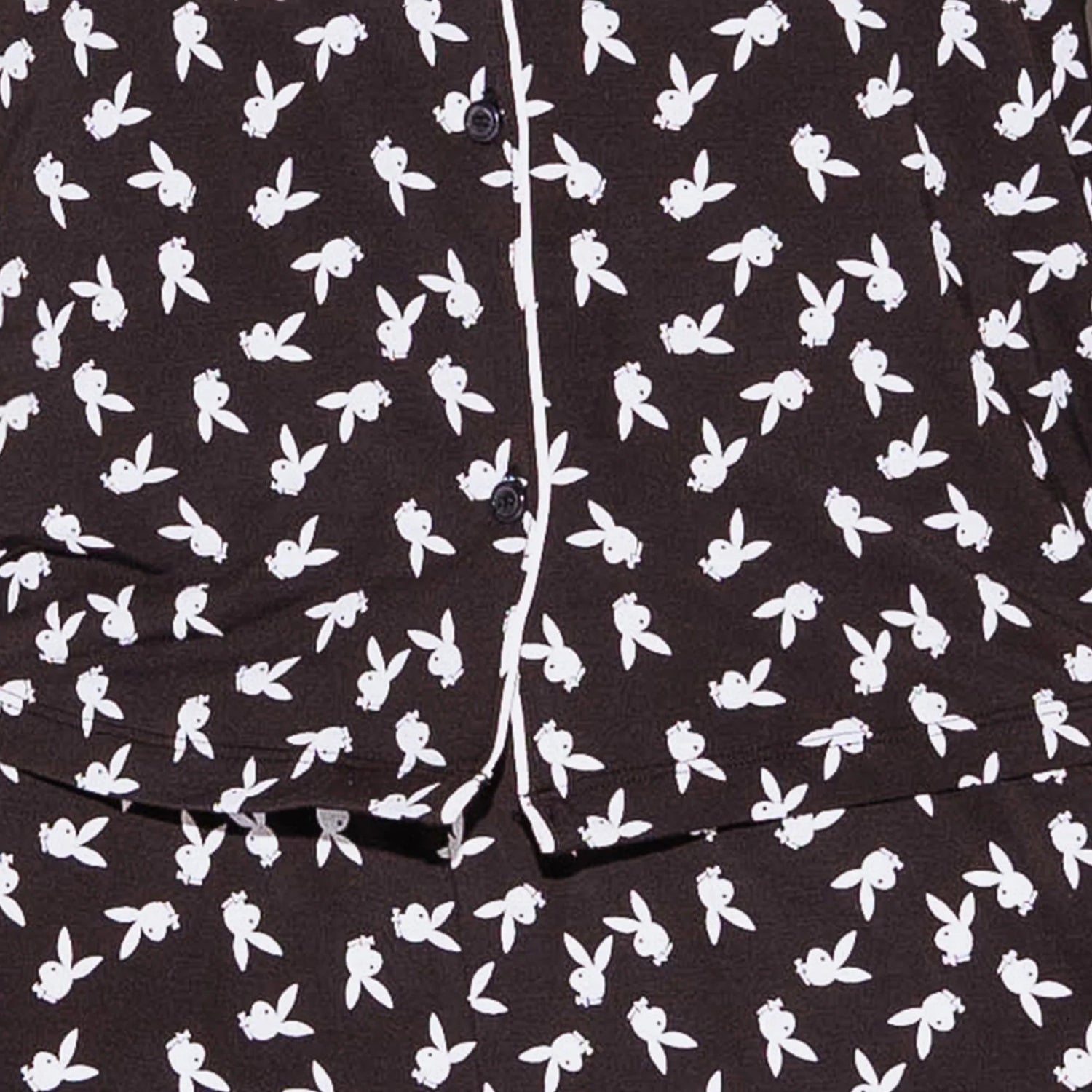 Black pajama set with white bunny pattern and white piping detail
