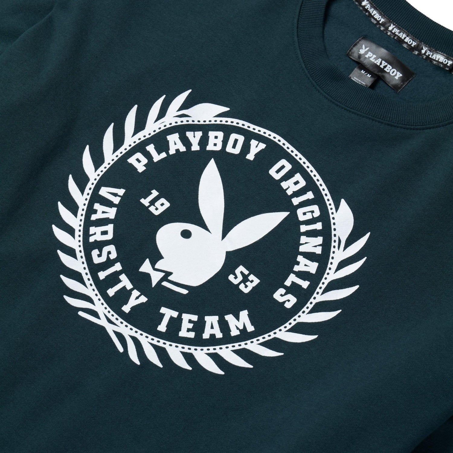 Women's dark green crewneck sweatshirt with white varsity logo and bunny emblem on chest