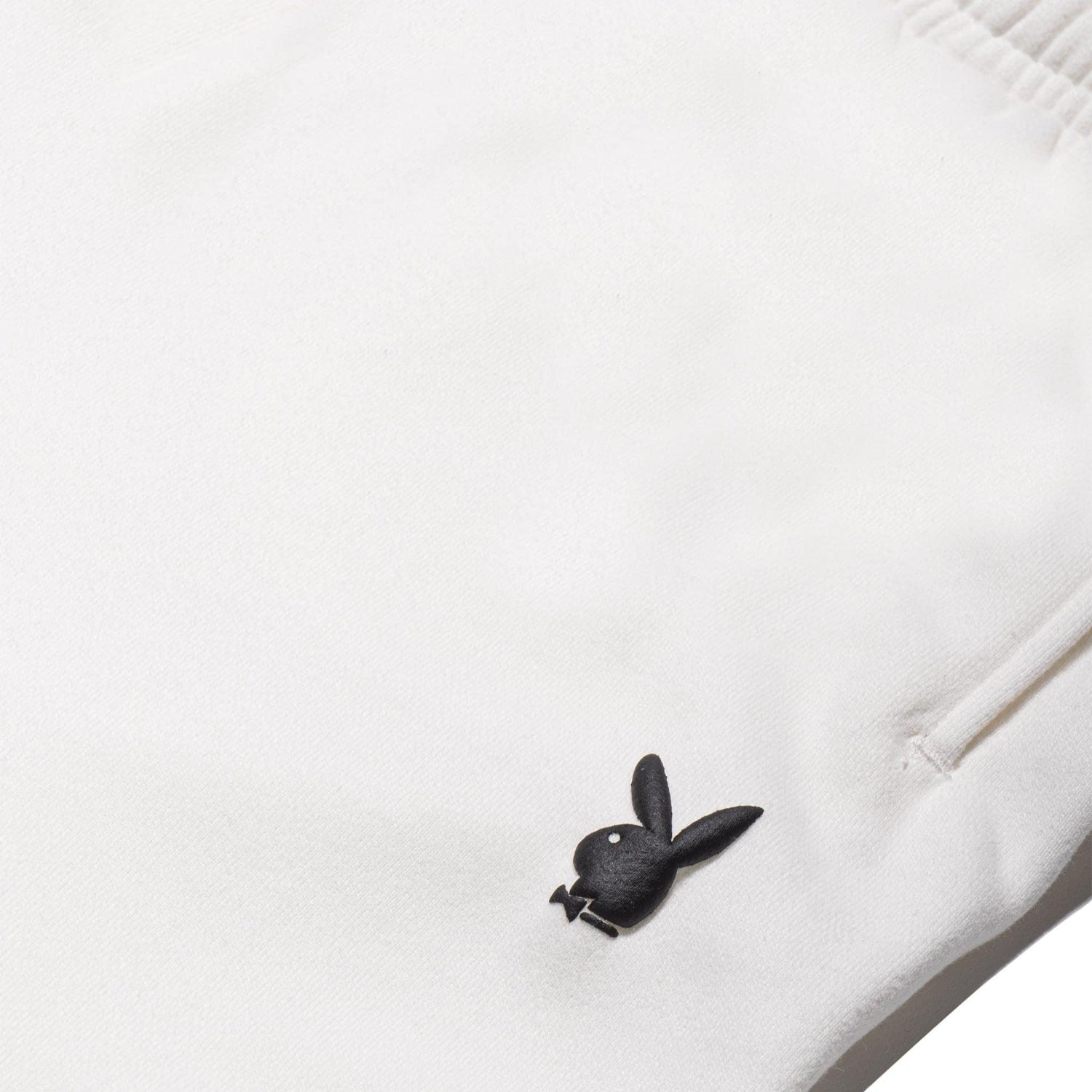 White women's sweatpants with black bunny logo and side pocket detail