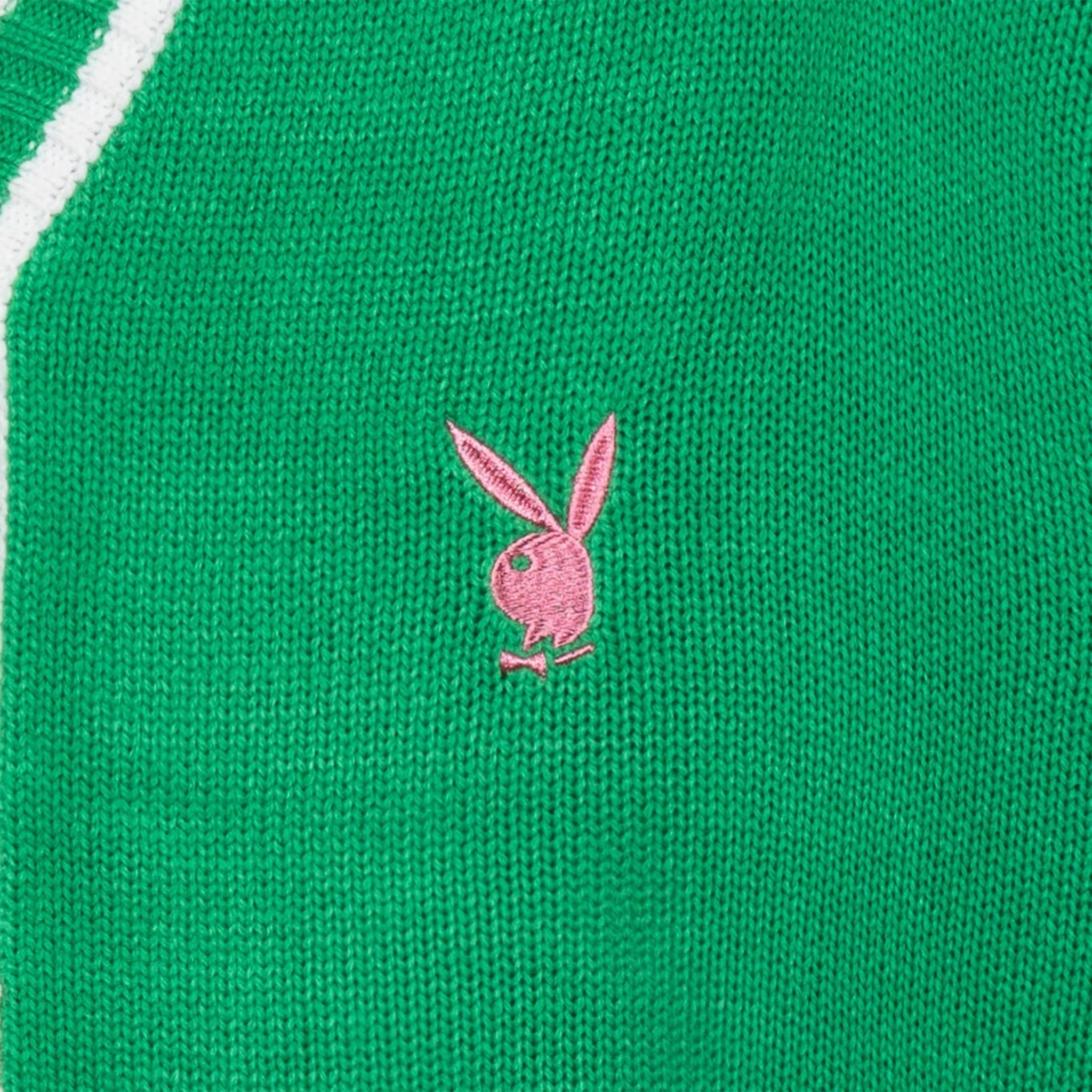 Green knit cardigan with pink bunny logo embroidery and white stripe detail