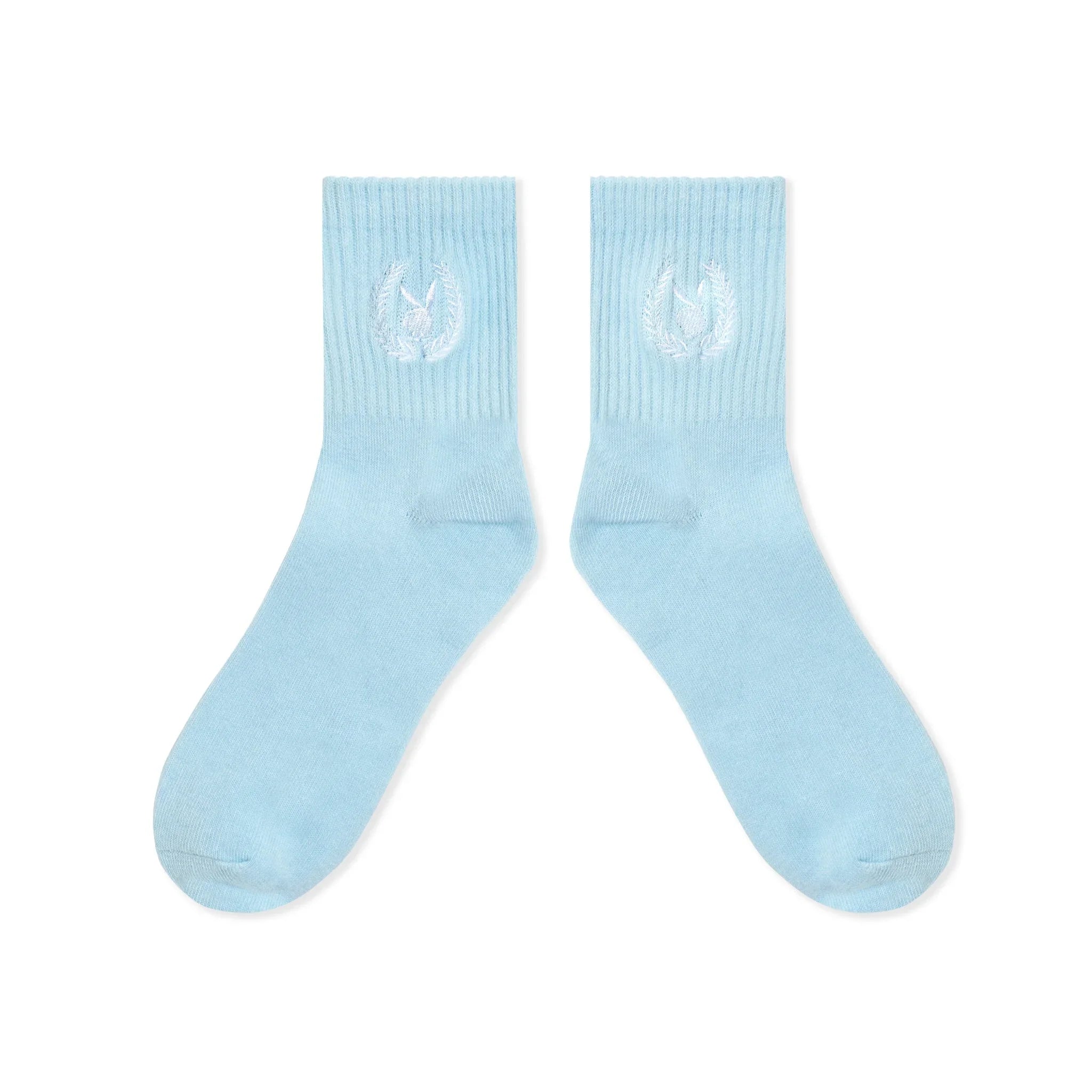 Light blue women's crew socks with white laurel leaf embroidery on ribbed cuffs.