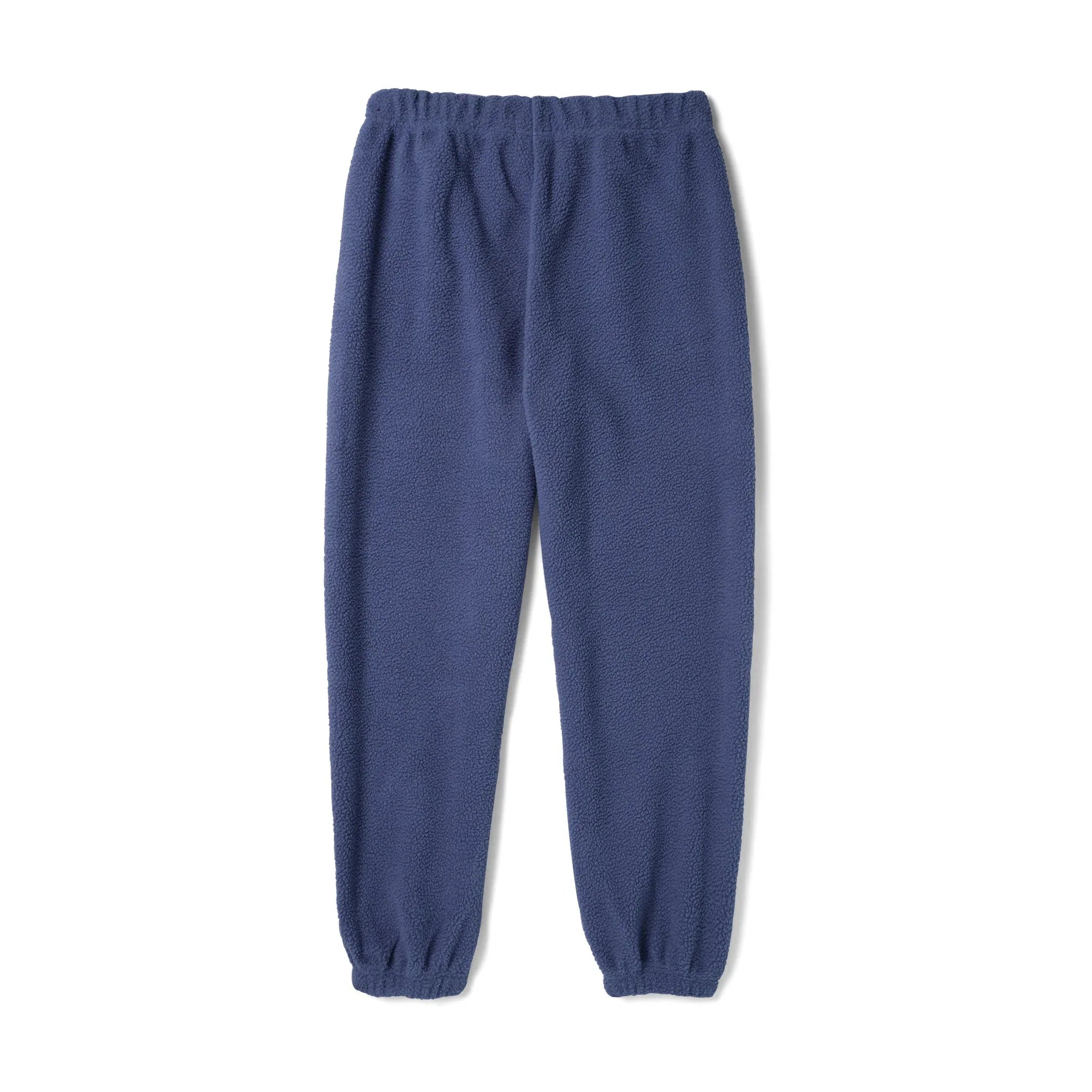 Women's blue polar fleece sweatpants with elastic waistband and cuffs on white background