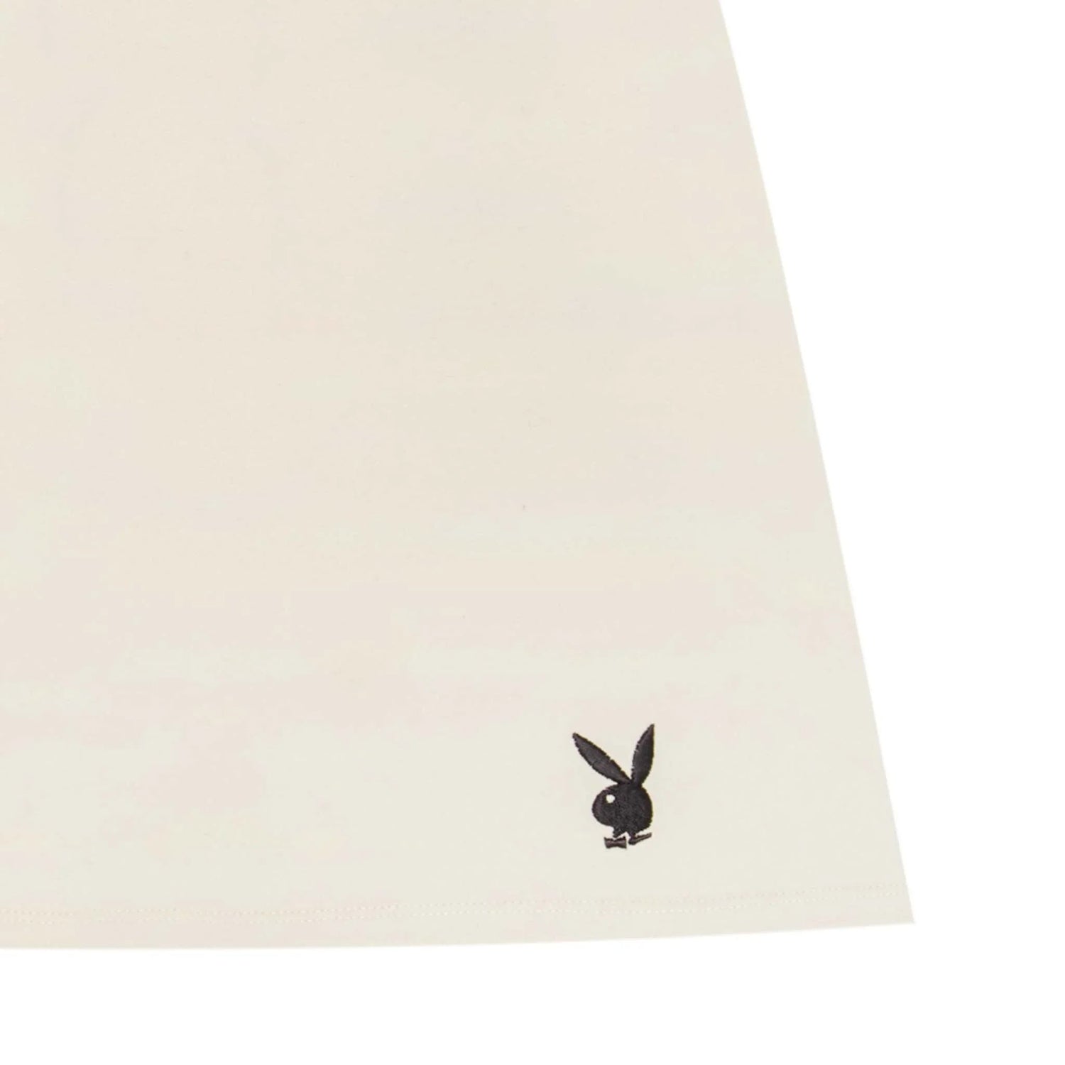 Ivory women's mini skirt with black bunny logo embroidery near hem