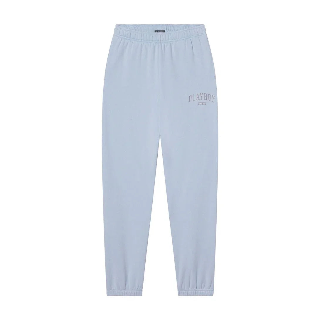 Light blue women's sweatpants with elastic waistband and PLAYBOY logo on left thigh.