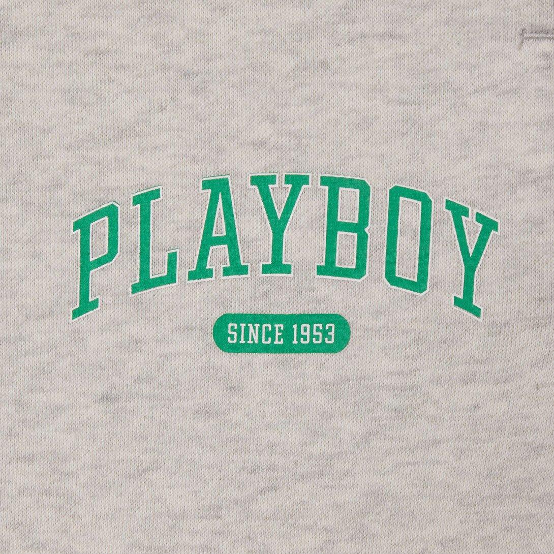 Light grey women's sweatpant fabric with green PLAYBOY since 1953 print detail