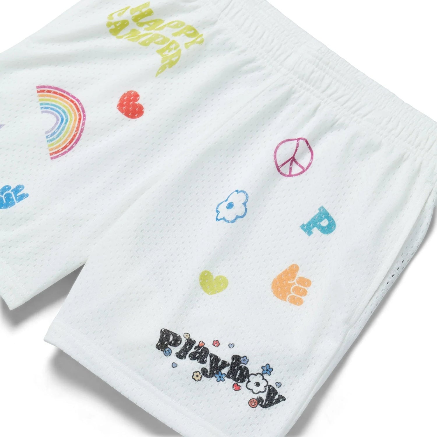 White women's basketball shorts with colorful peace, heart, rainbow, and flower graphics