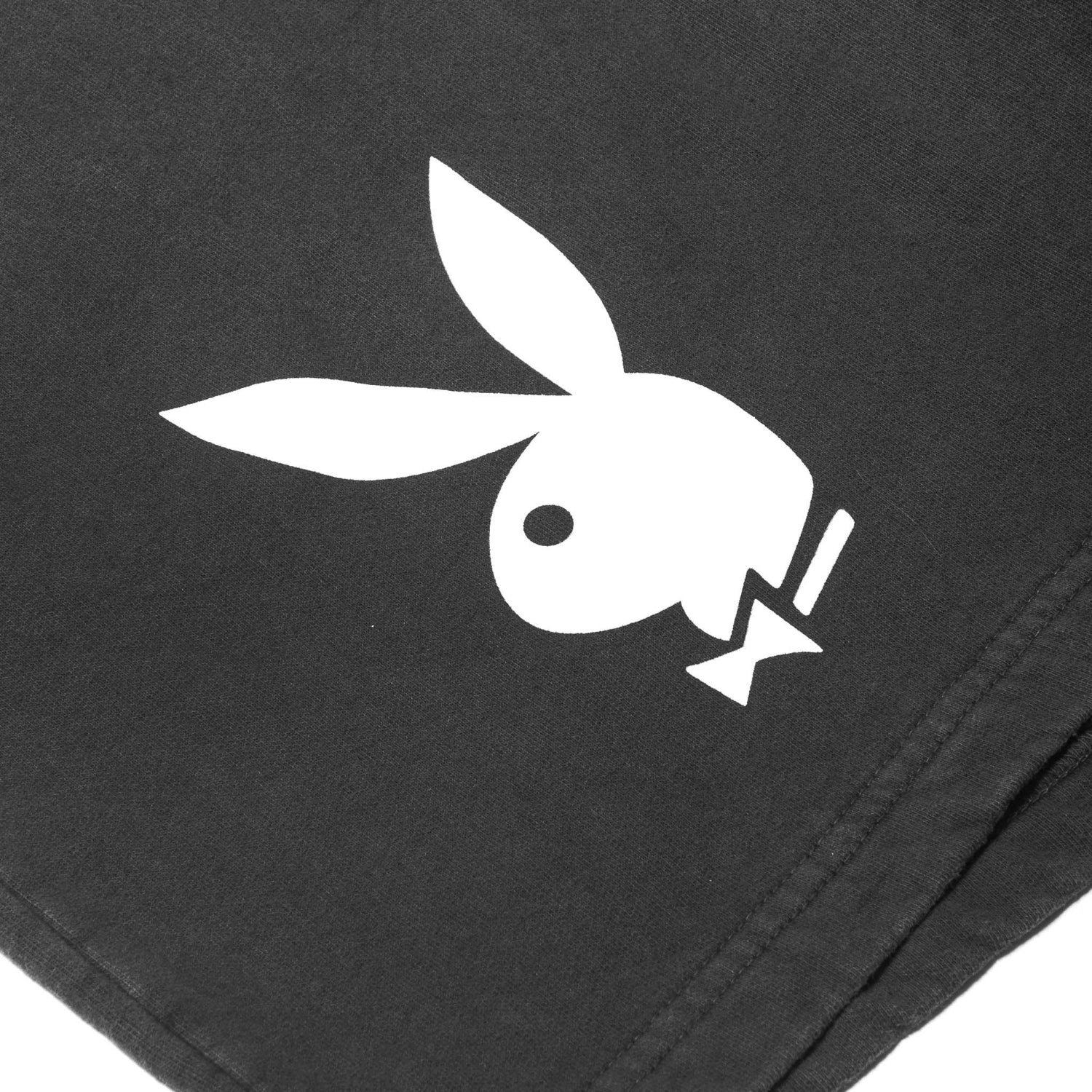 Black sweatshorts with large white bunny head graphic print on fabric