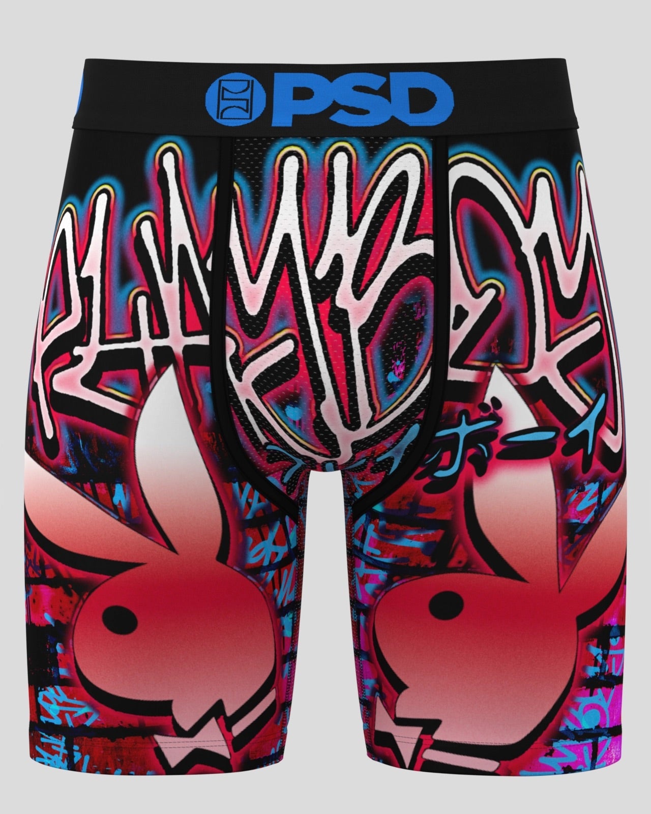 A pair of boxer briefs featuring a vibrant graffiti-style graphic print in pink, red, blue, and black, with the Playboy bunny logo and Japanese text, and a black waistband with a blue PSD logo.