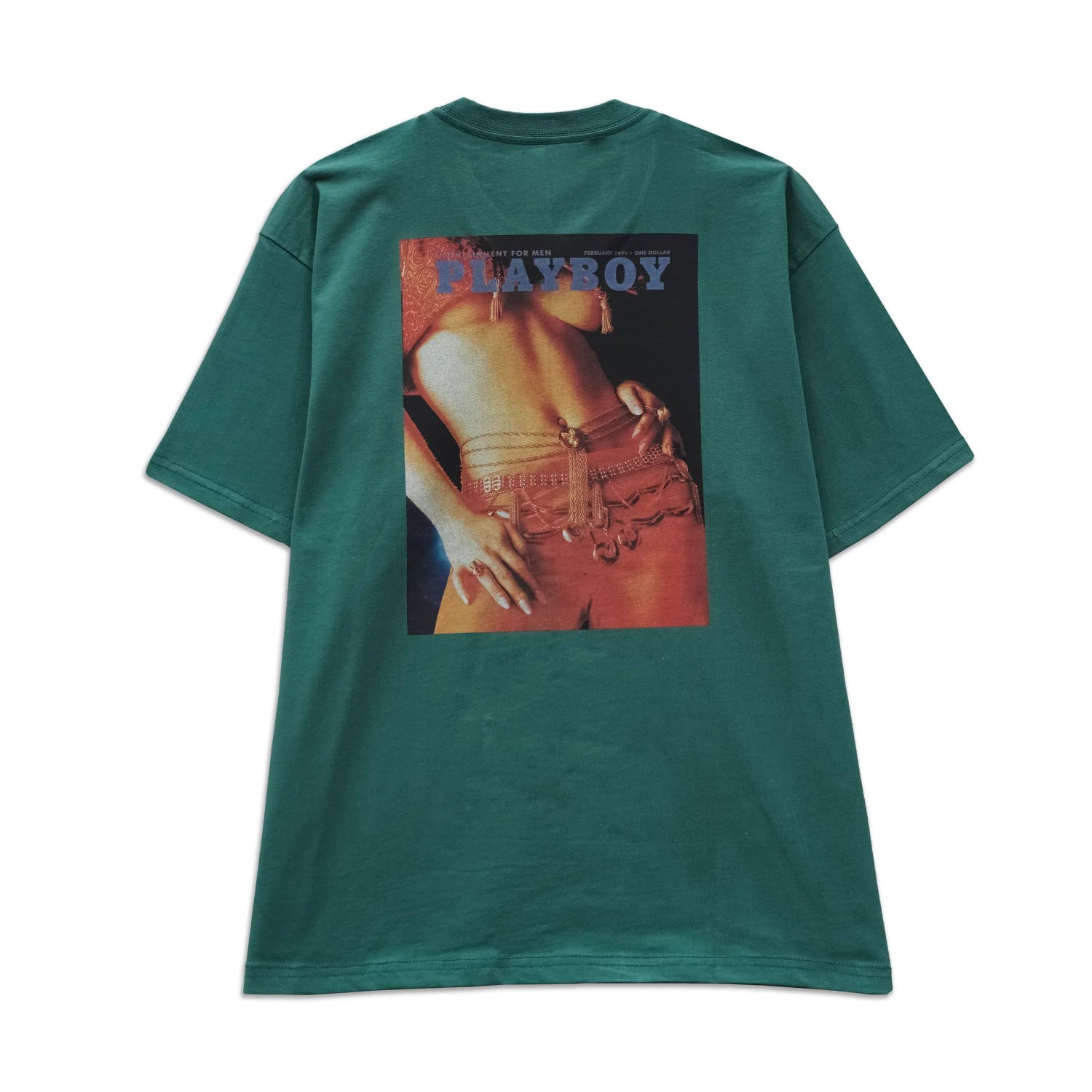 Green graphic T-shirt with vintage magazine cover art on the back, featuring a model and decorative belt.