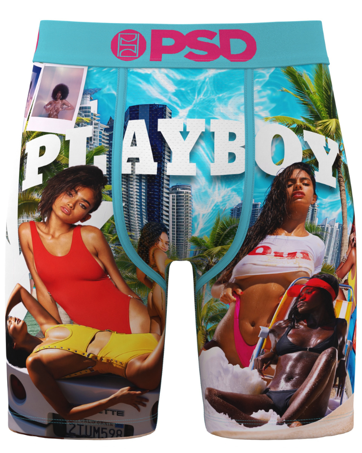 Playboy branded underwear with models and cityscape design on a white background