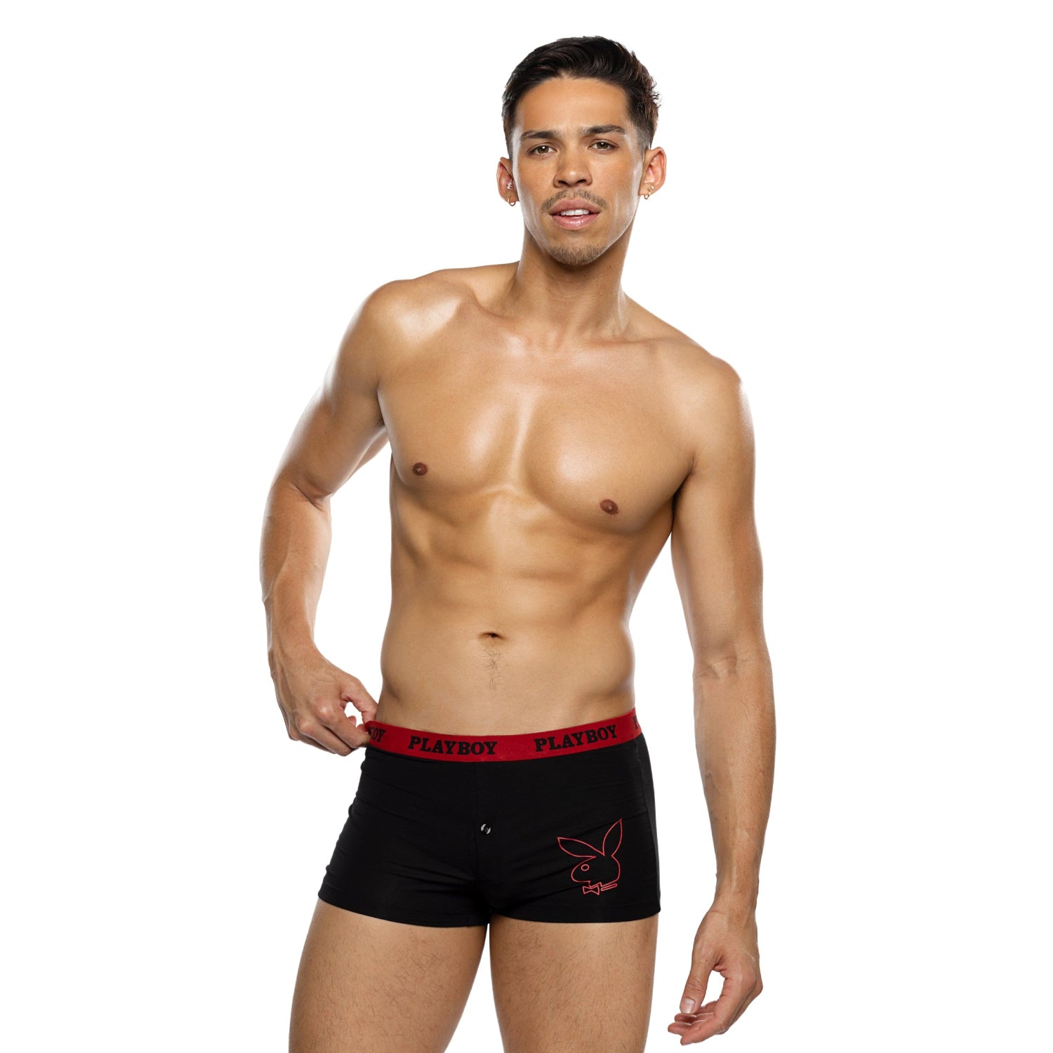 Male model wearing black boxer briefs with red waistband and logo on white background
