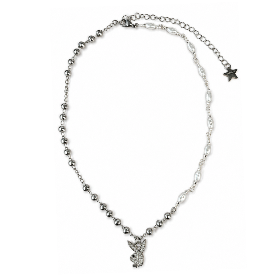 Silver necklace with a small pendant on a white background