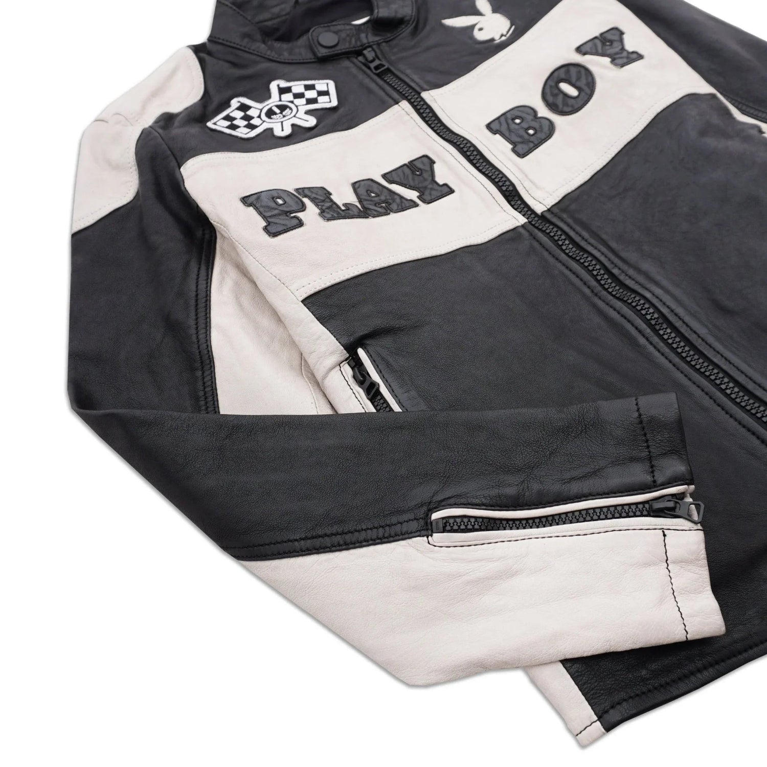 Black and white men's leather jacket with zipper, patches, and PLAY BOY lettering on front
