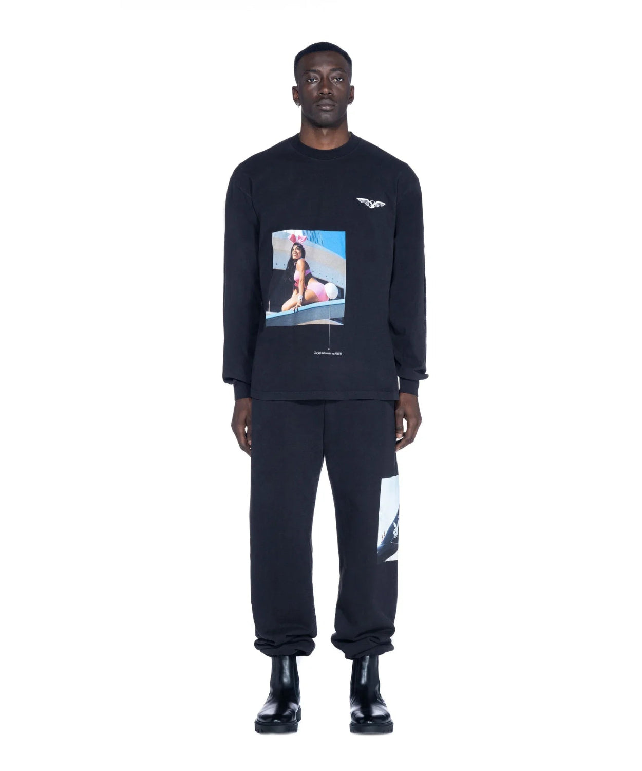 Man wearing black long sleeve t-shirt with aviation wings and graphic photo print